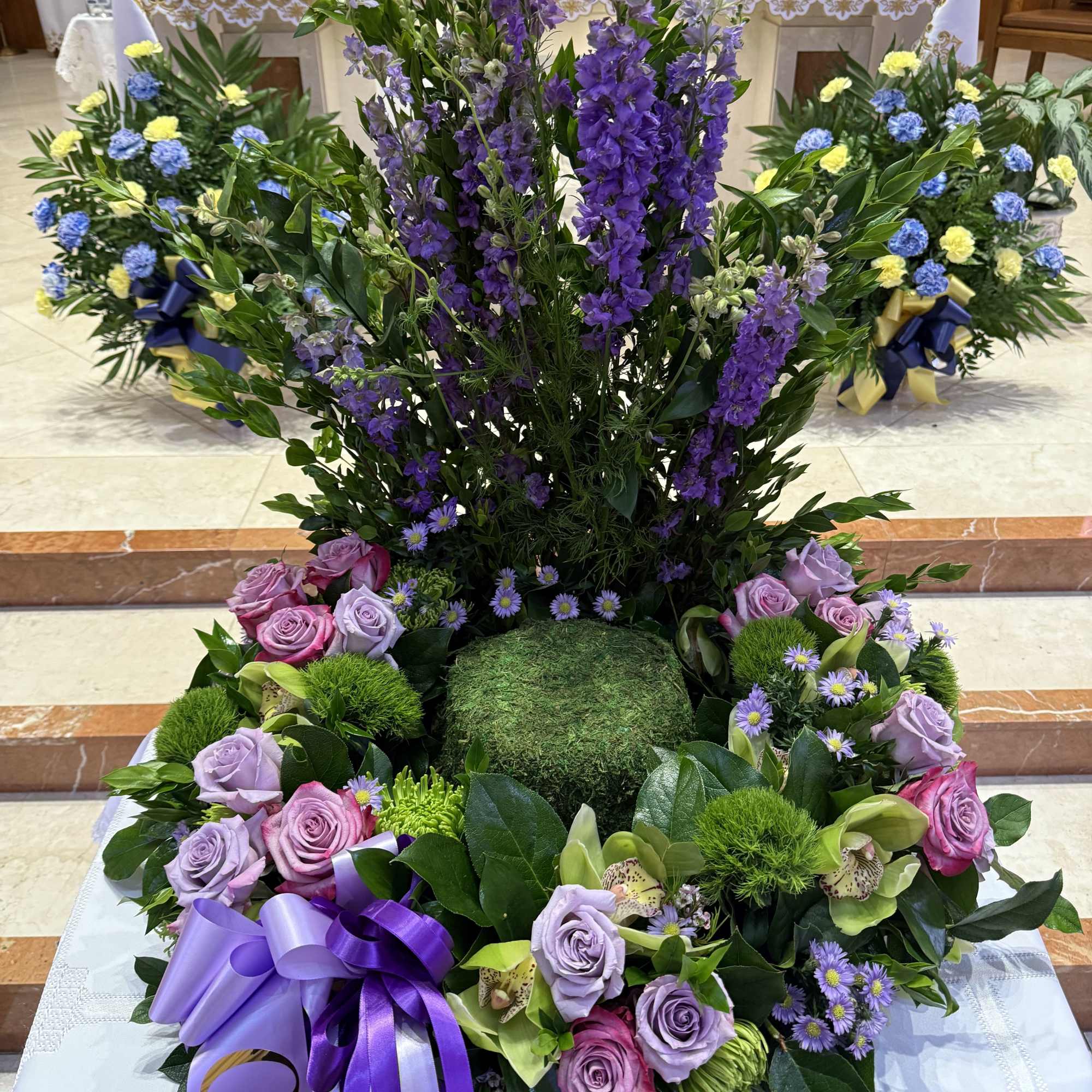 This round urn holding piece can be made in purple and lime