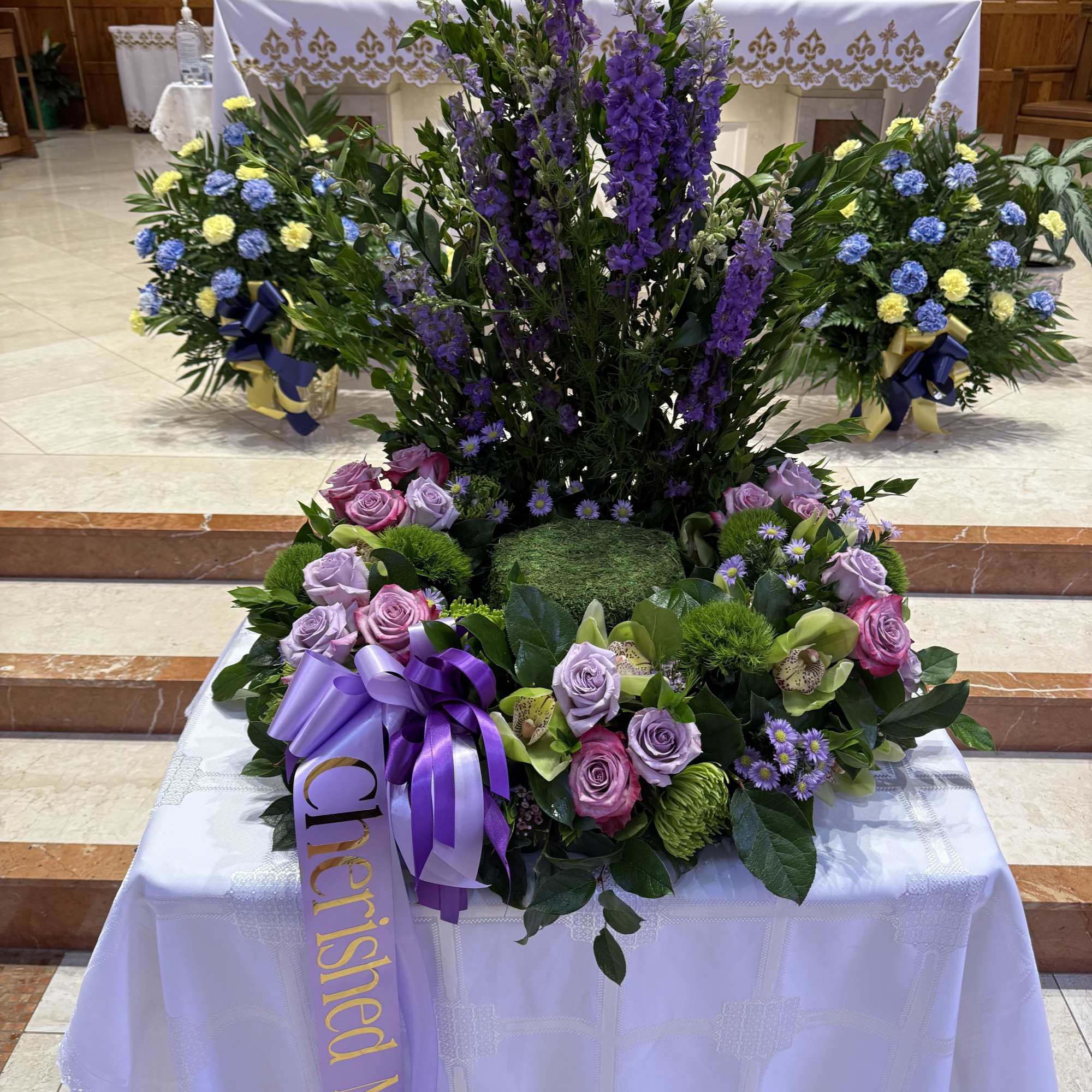 This round urn holding piece can be made in purple and lime