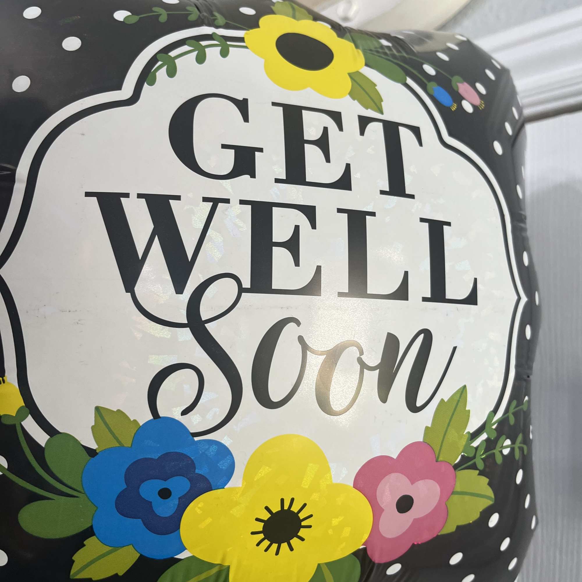 Large spring bouquet in a vase with several varieties of flowers to