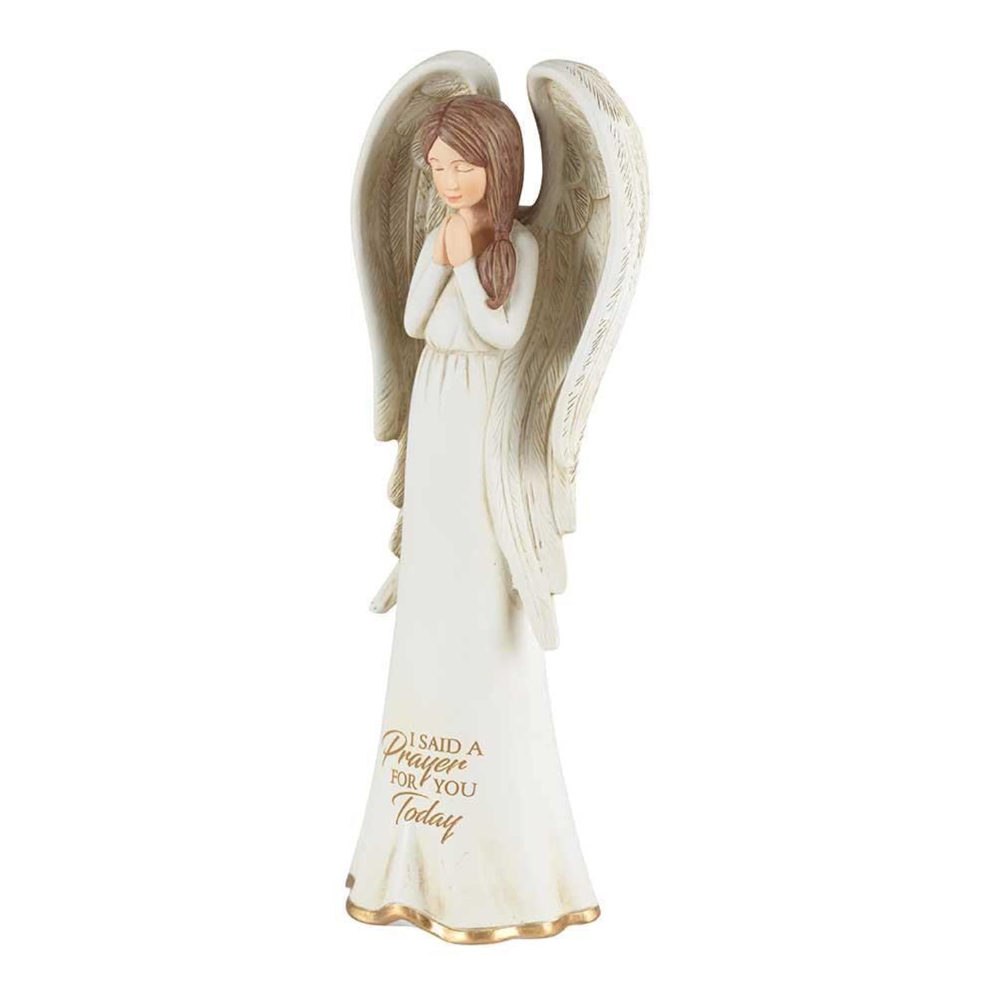 Angel with head bowed and hands folded in prayer. Inscription on her