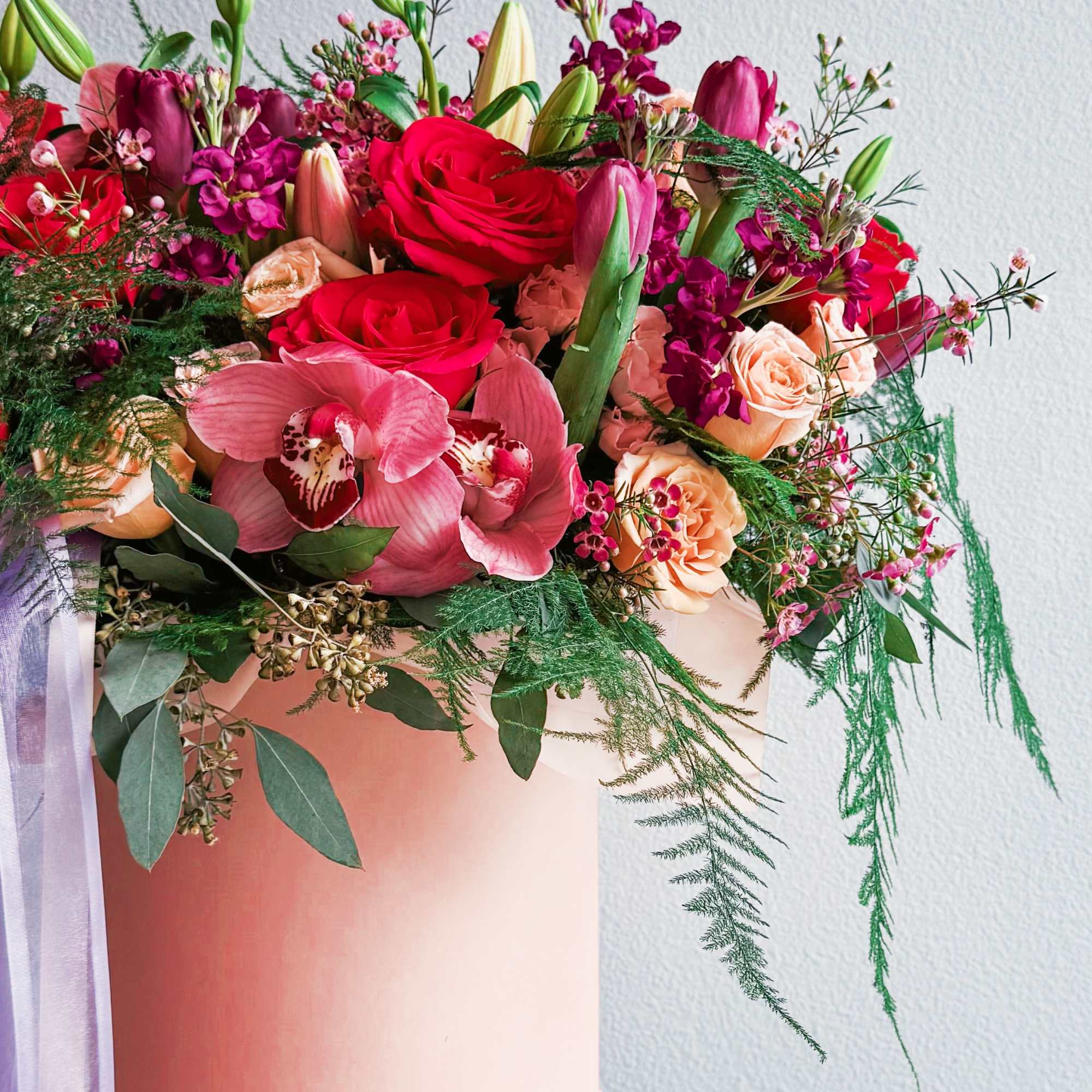 This bouquet is a total showstopper! With its fiery red roses, soft This bouquet is a total showstopper! With its fiery red roses, soft