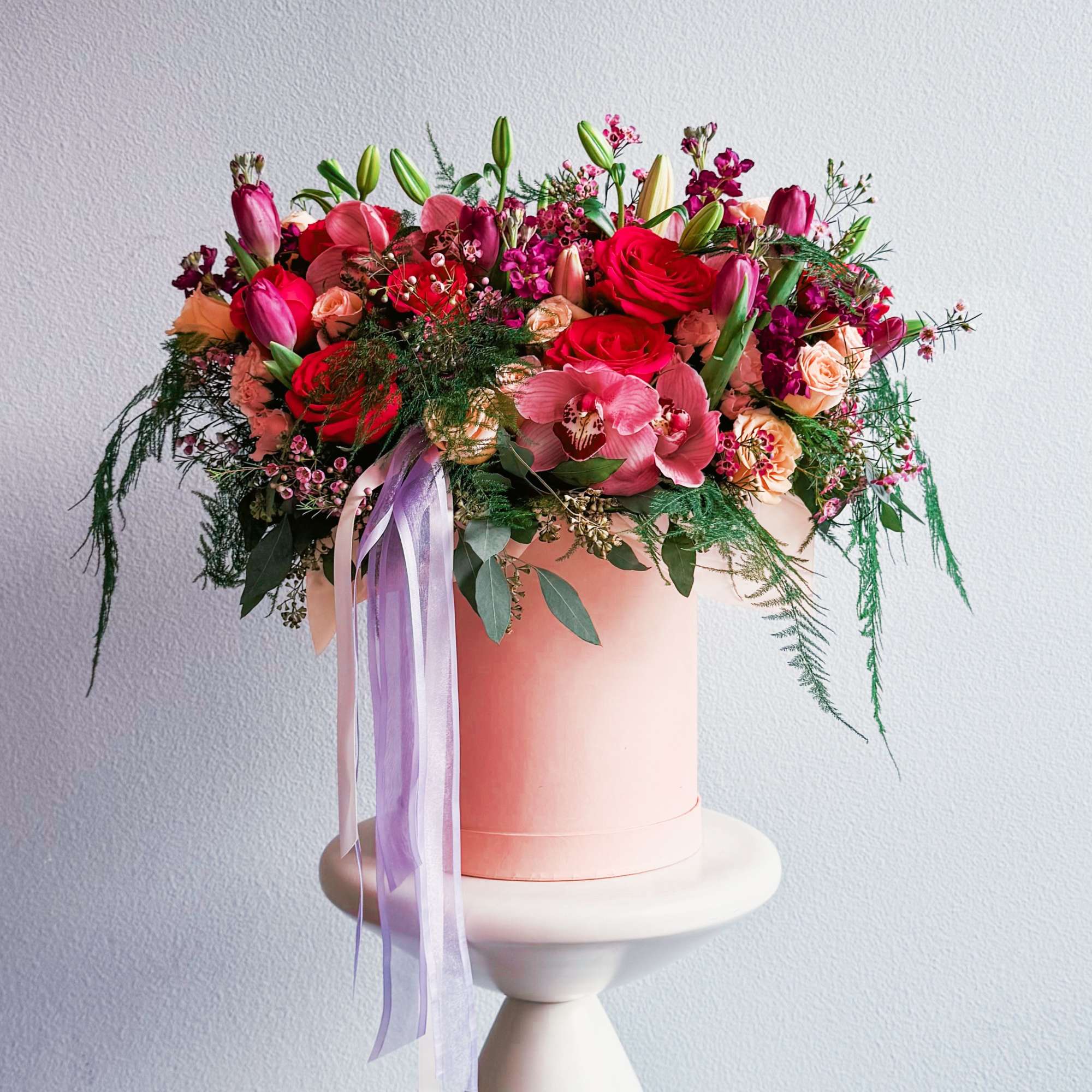 This bouquet is a total showstopper! With its fiery red roses, soft This bouquet is a total showstopper! With its fiery red roses, soft