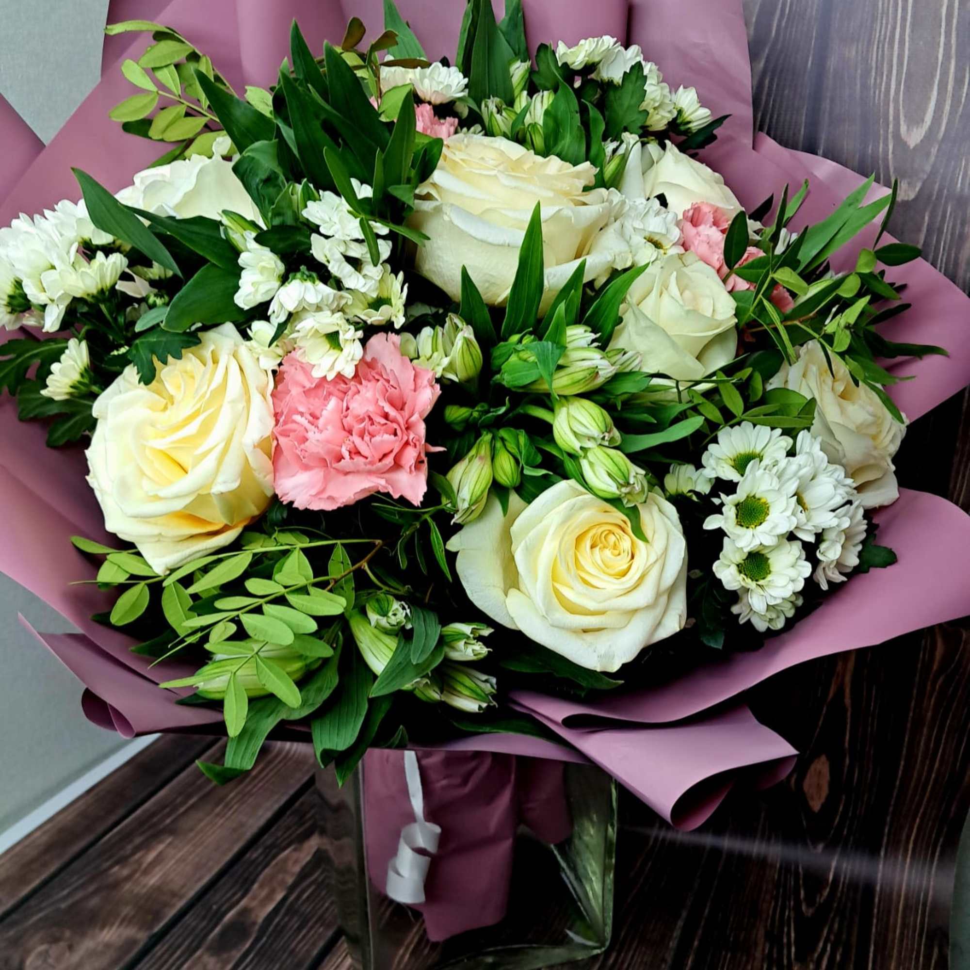 Cloud N9. Bouquet of flowers with white roses as respect.
The composition of