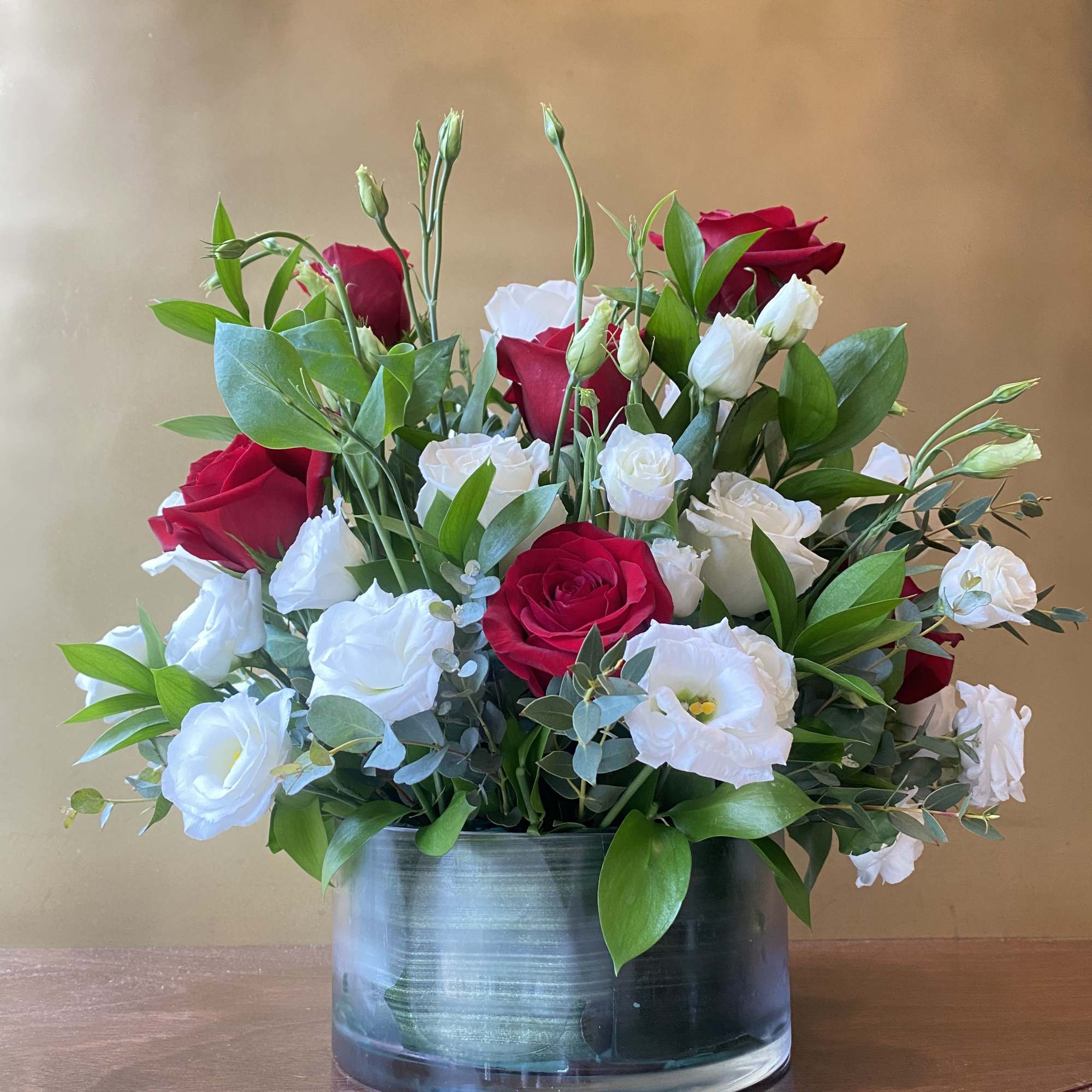 Serenade your love with this beautiful bouquet of red and white roses!