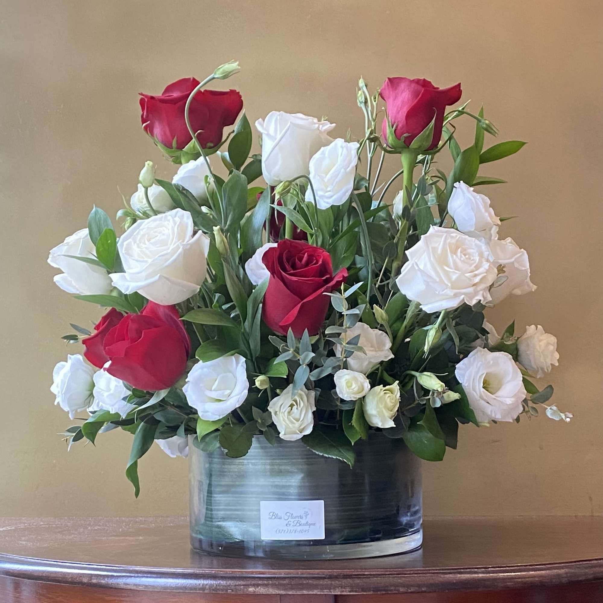 Serenade your love with this beautiful bouquet of red and white roses!