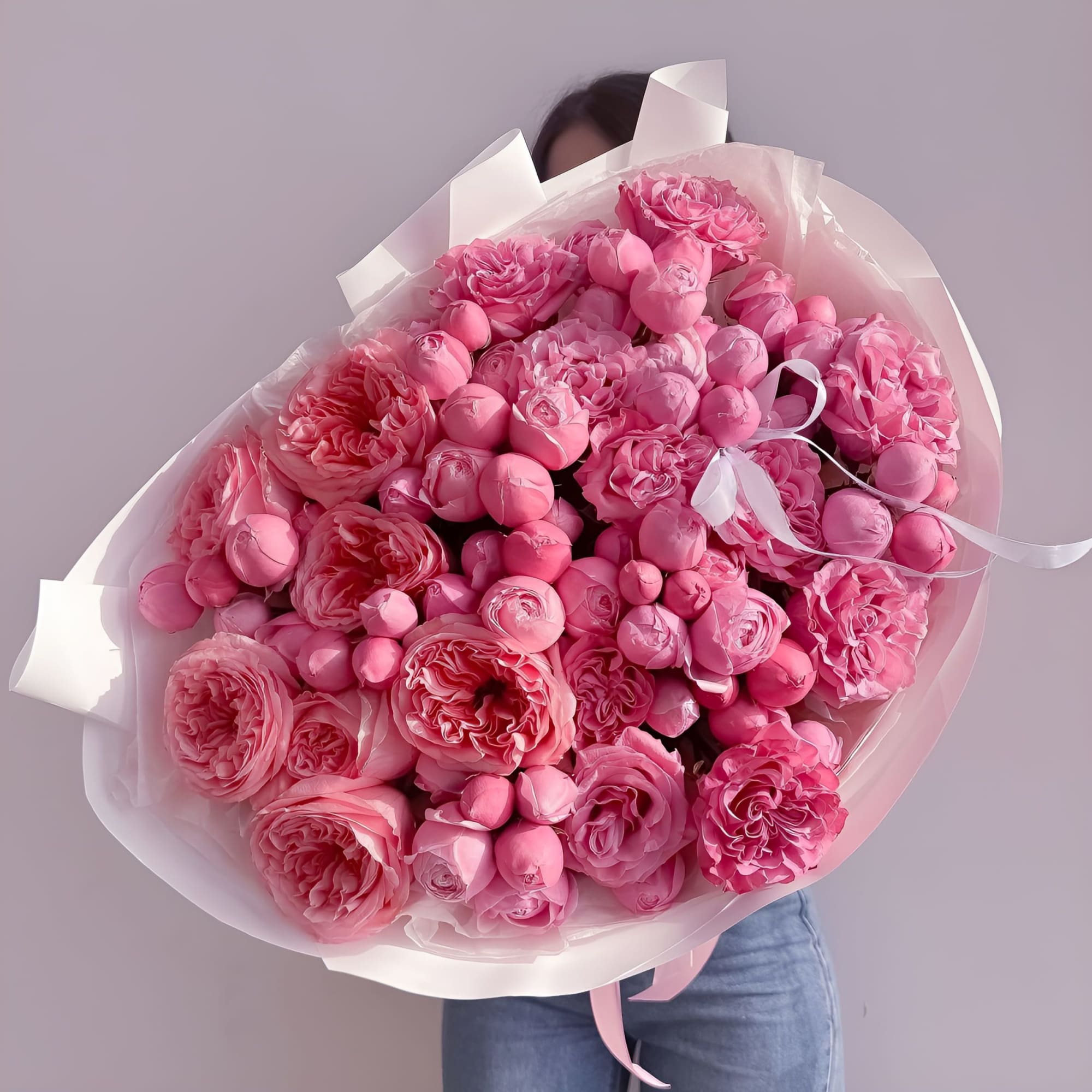 An irresistible burst of rich pink garden roses and spray roses, Pink