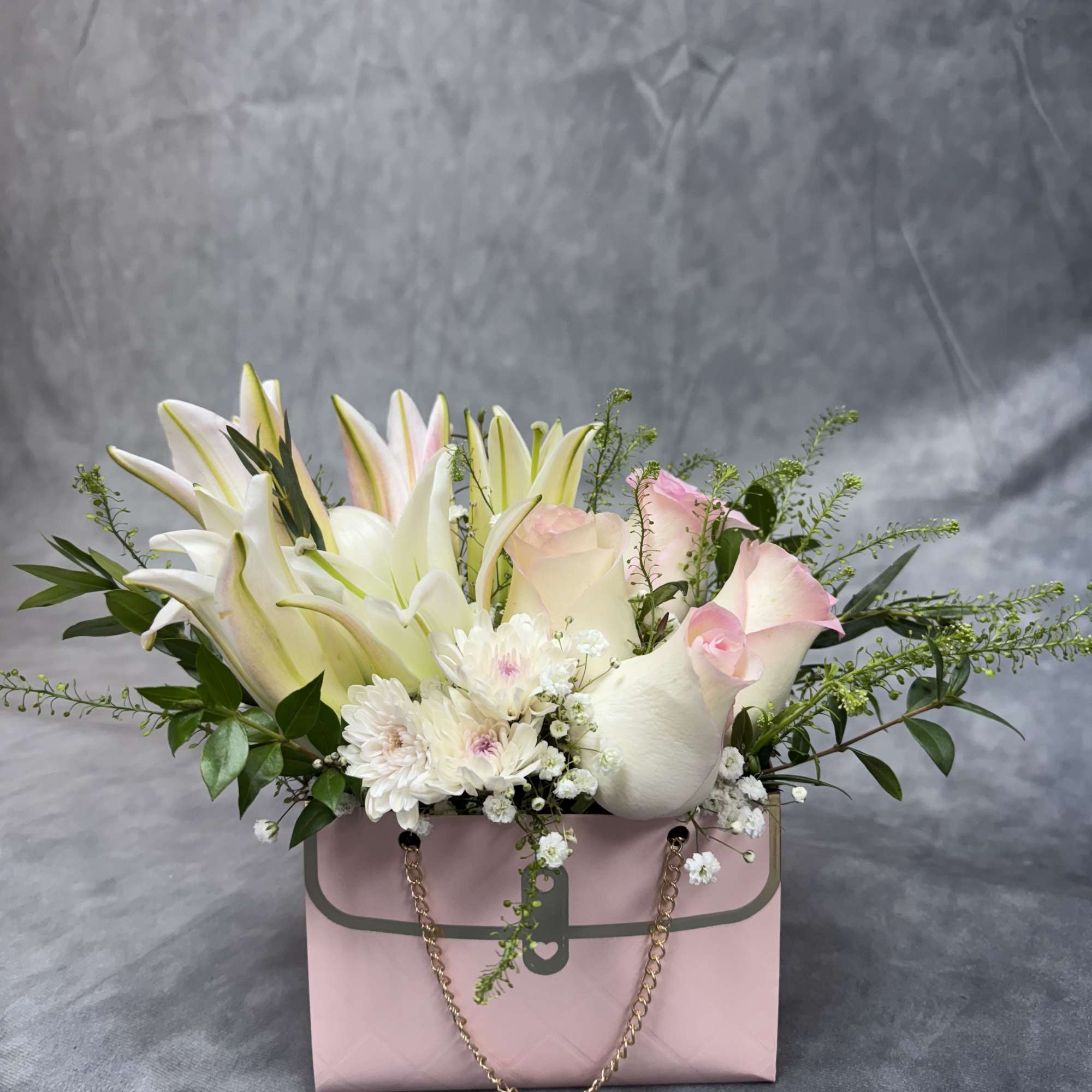 A high-fashion floral bag inspired by luxury and elegance. Featuring blends of A high-fashion floral bag inspired by luxury and elegance. Featuring blends of