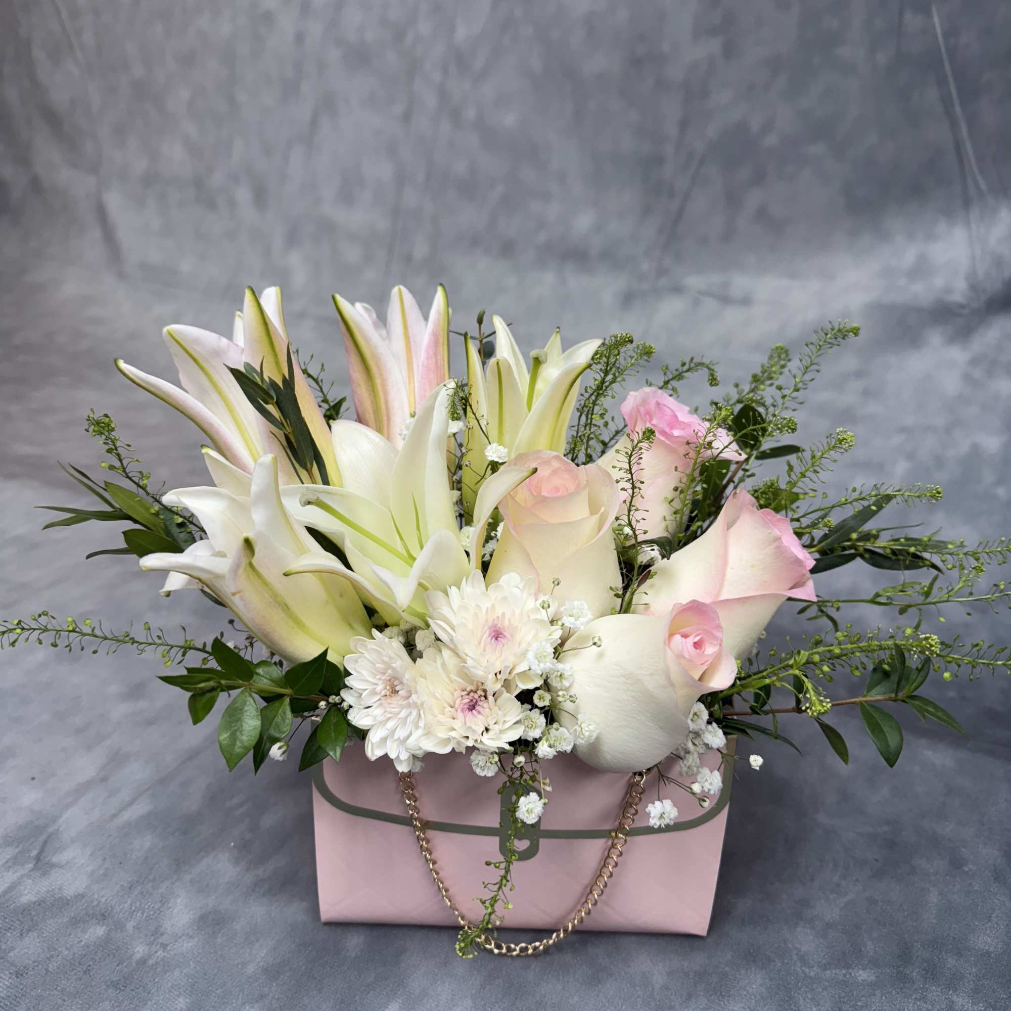 A high-fashion floral bag inspired by luxury and elegance. Featuring blends of A high-fashion floral bag inspired by luxury and elegance. Featuring blends of