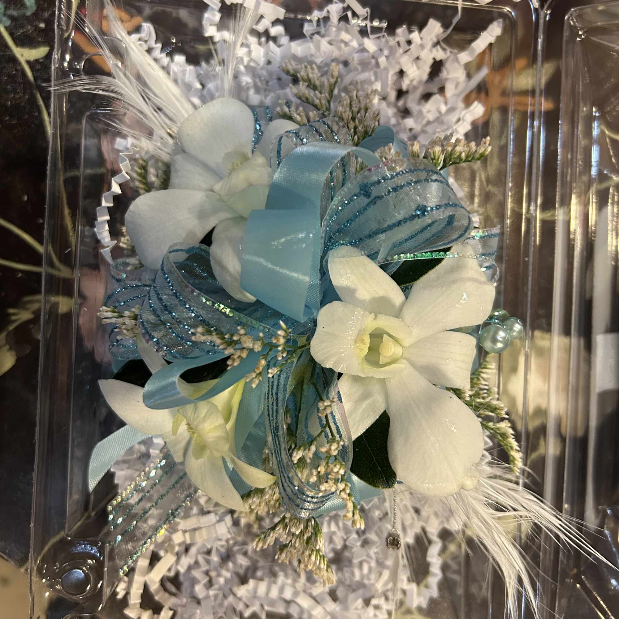 A designer's choice wristlet will be created using seasonal flowers.
Flower color options: A designer's choice wristlet will be created using seasonal flowers.
Flower color options: