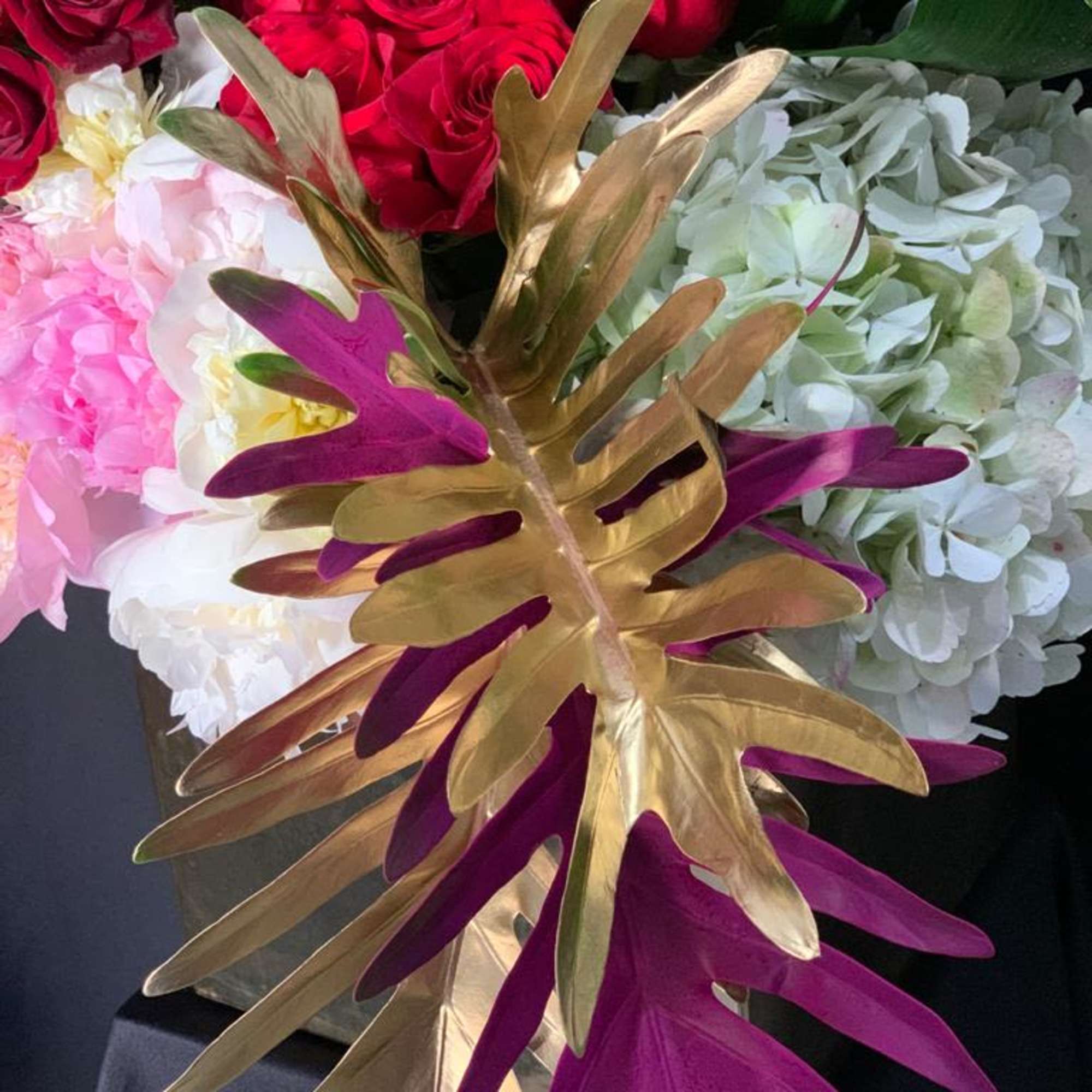 Discover the beauty of our Mixed Red Roses, Hydrangeas, and Peonies Flower