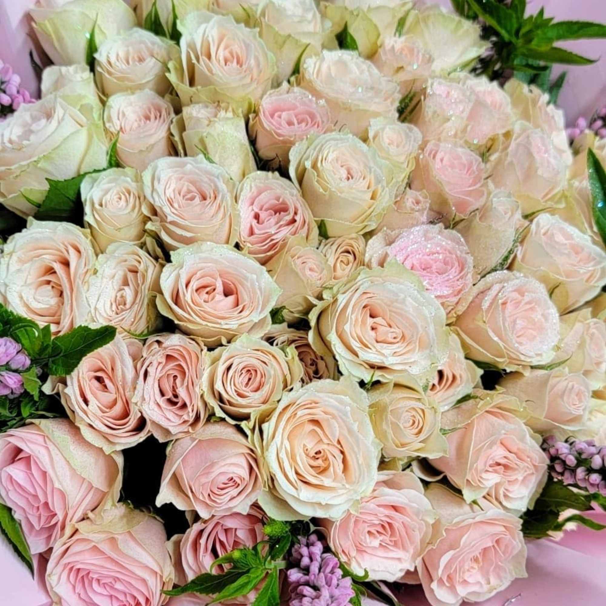This marvelous bouquet is made up of pink spray roses and pink