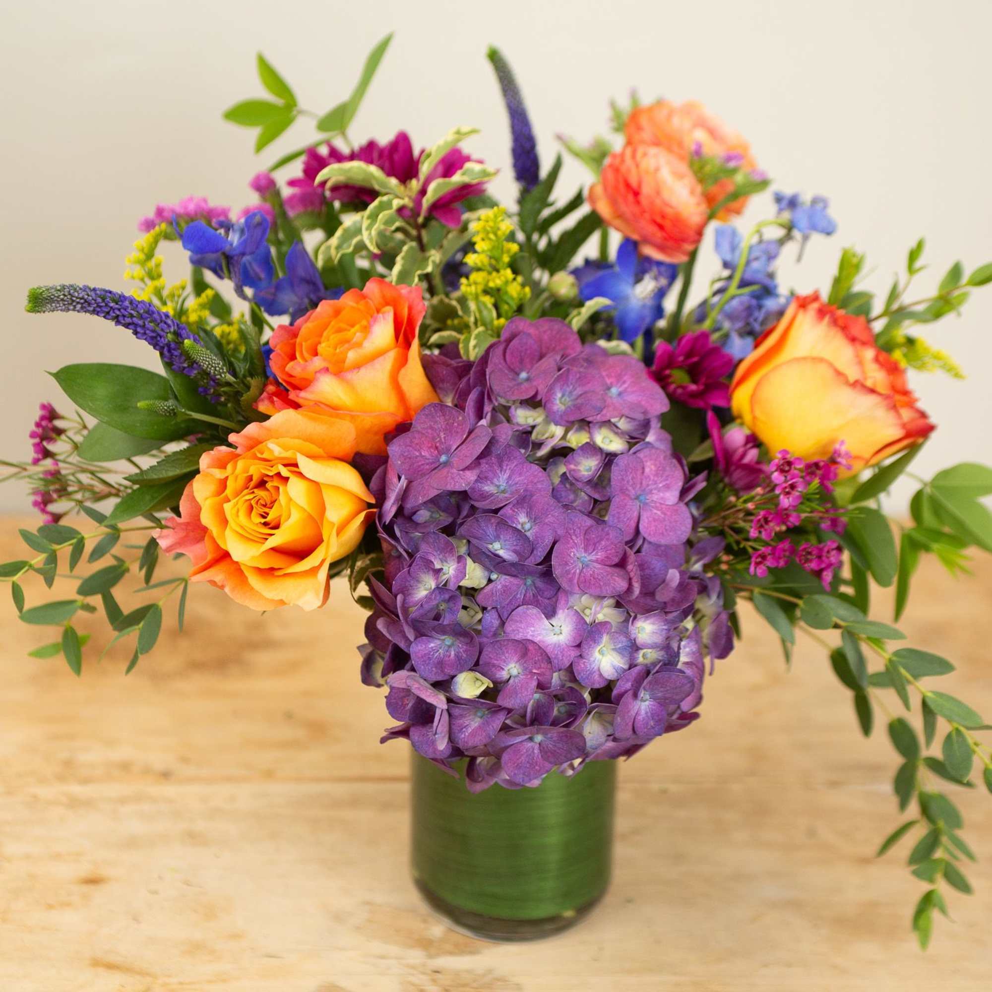 Let us create an arrangement of our favorite flowers of the day!