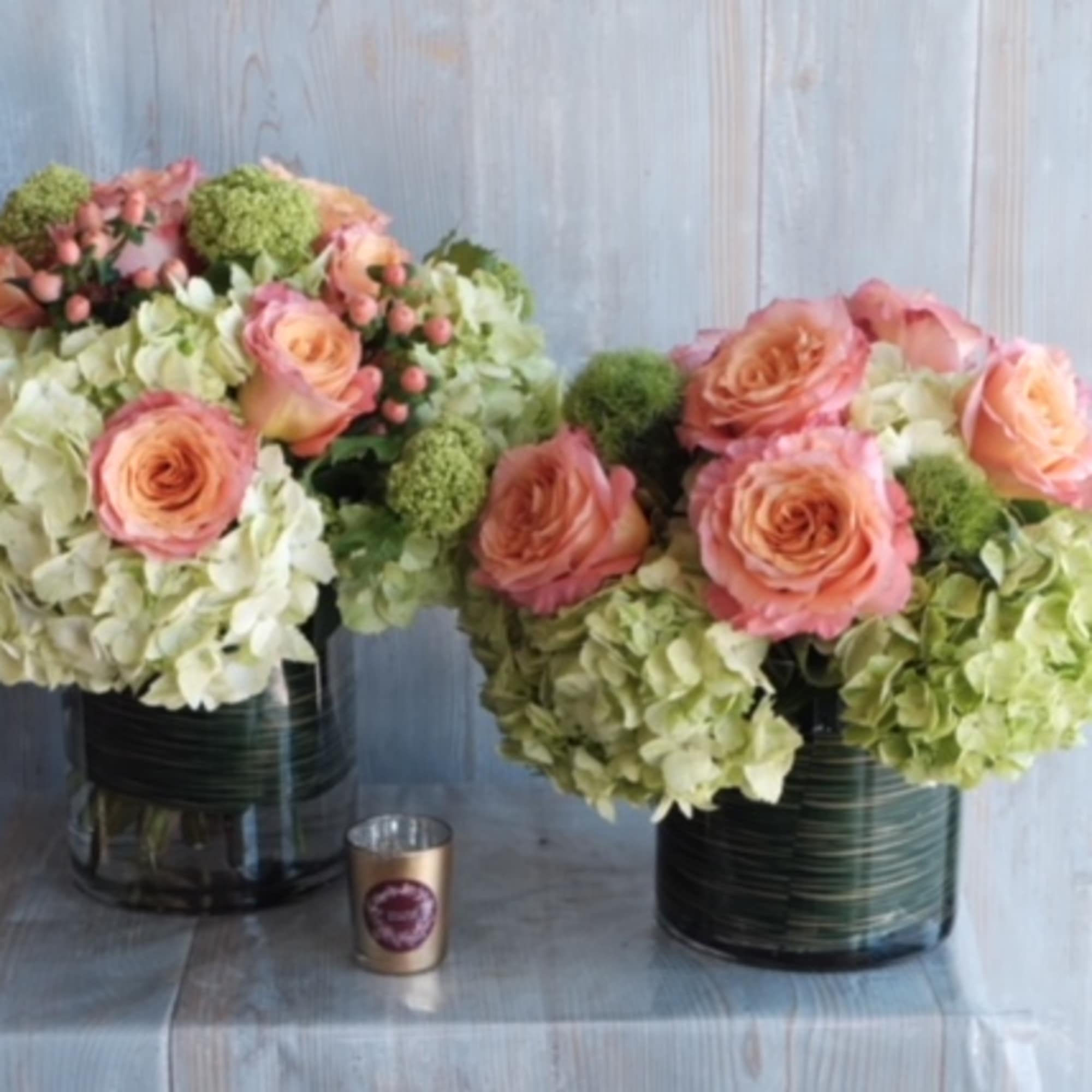 Indulge in the delightful beauty of peach roses and hydrangeas with our