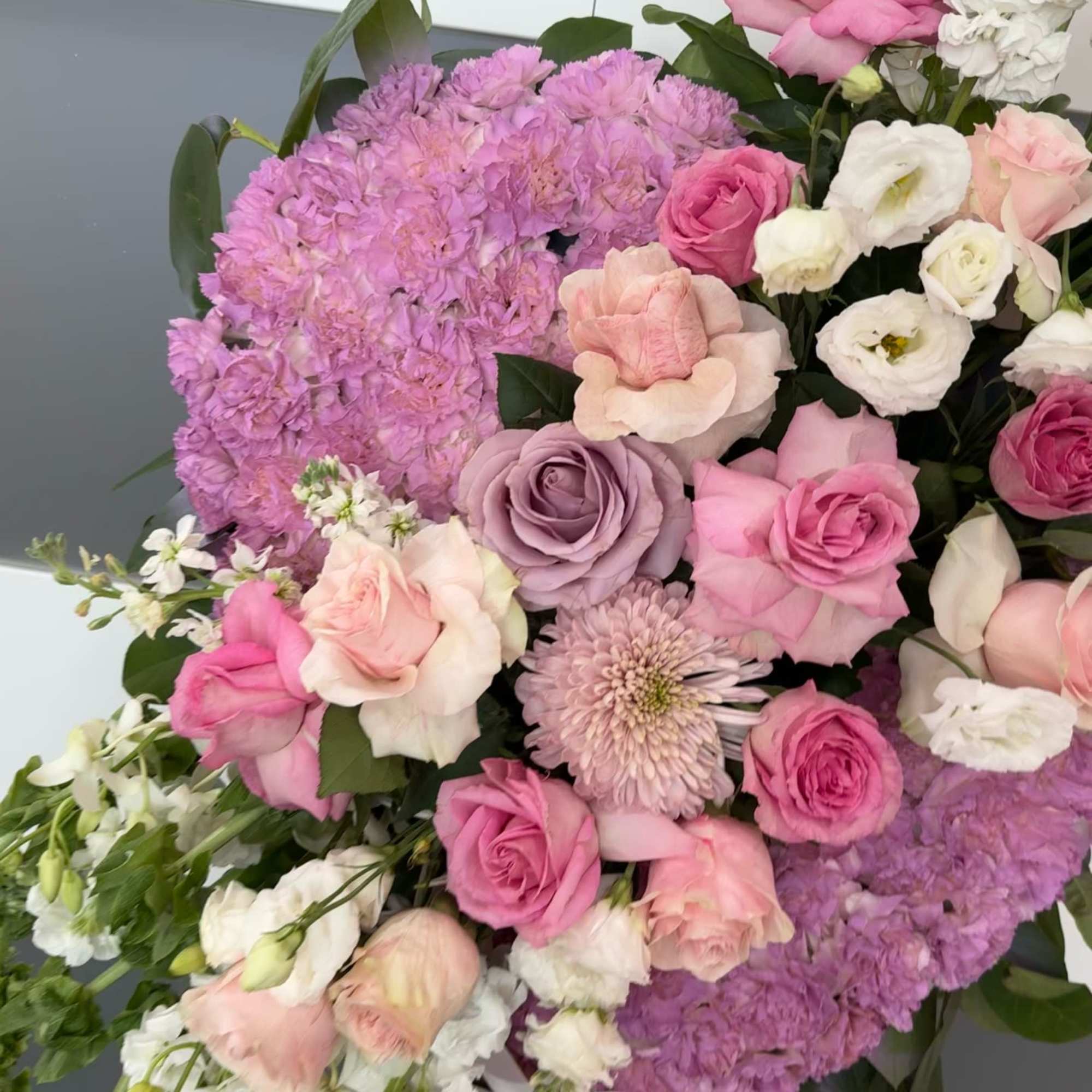 Express your deepest sympathy with our an artful statement piece. Our large