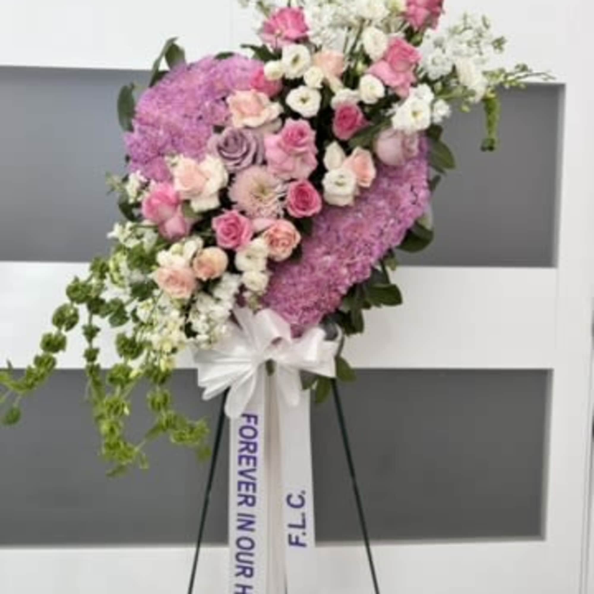 Express your deepest sympathy with our an artful statement piece. Our large