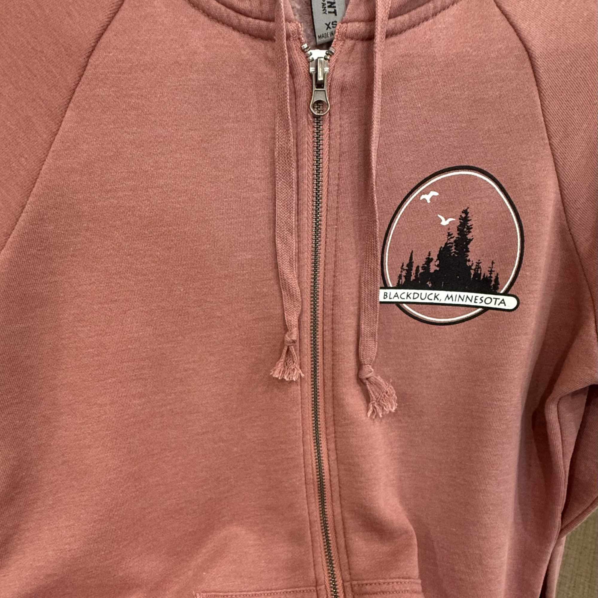 Soft, comfortable hoodie available in two colors.  Sizes available are XS-2XL.