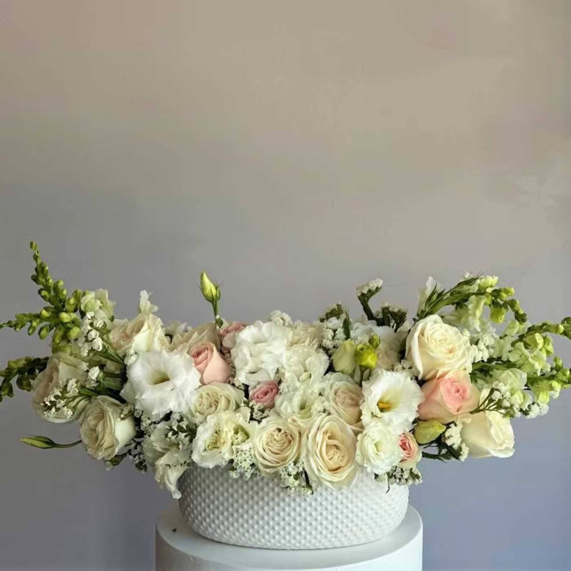 Soft, graceful, and full of gentle warmth &mdash; the Nora bouquet is