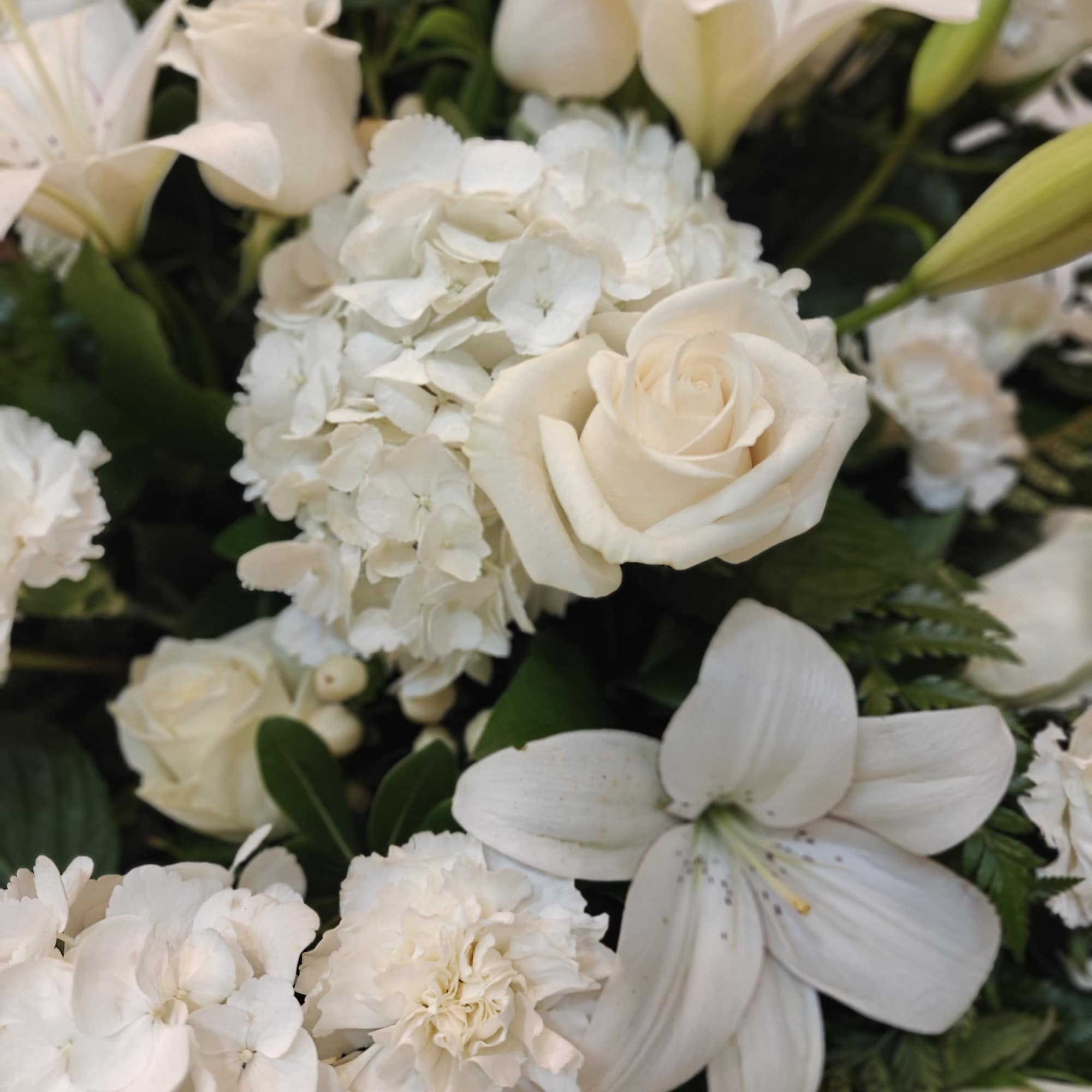 Large spray on an easel. All White unless you choose another flower Large spray on an easel. All White unless you choose another flower