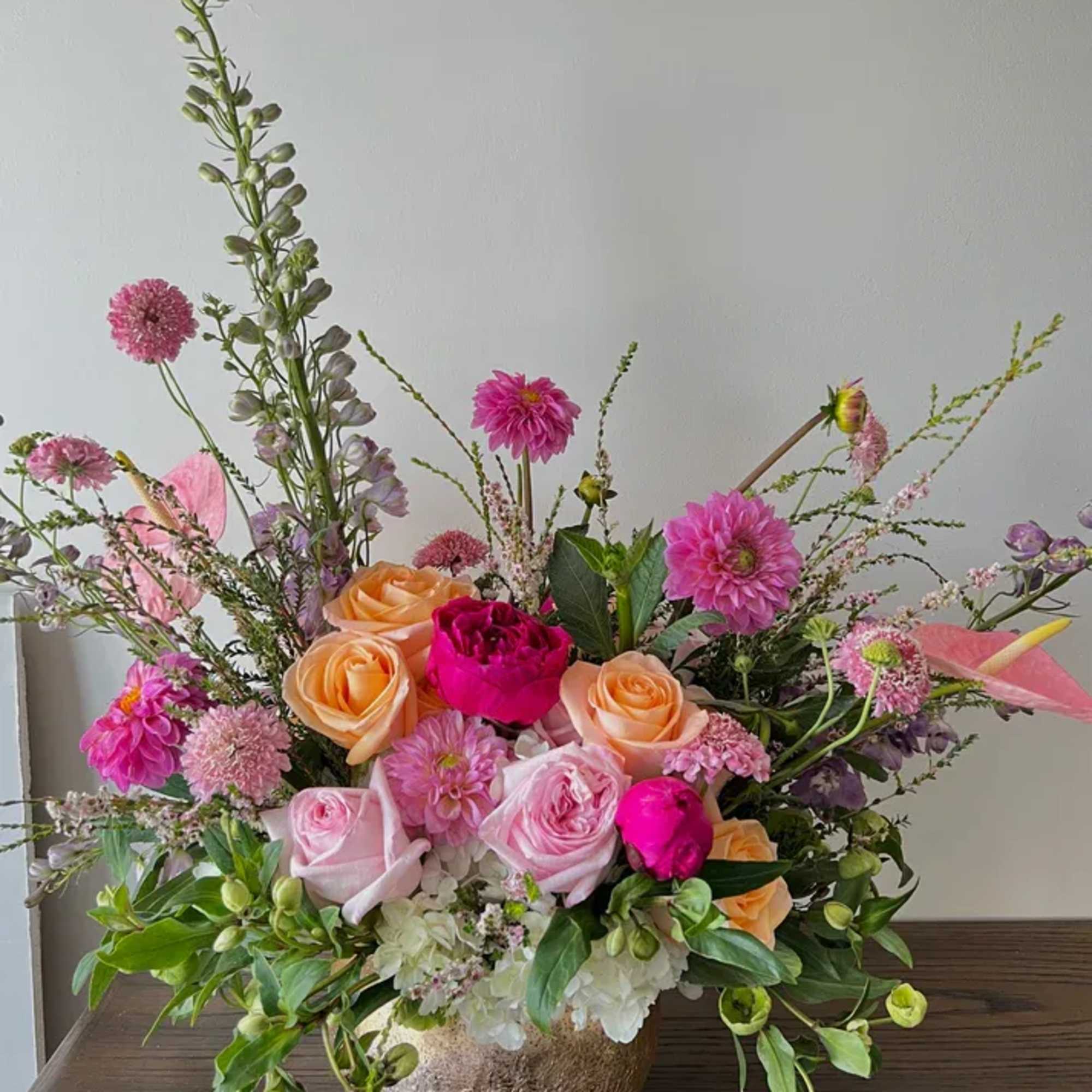 Our “Enchant Me” arrangement inspires fresh blush beauty surrounded by gardenful greenery Our “Enchant Me” arrangement inspires fresh blush beauty surrounded by gardenful greenery