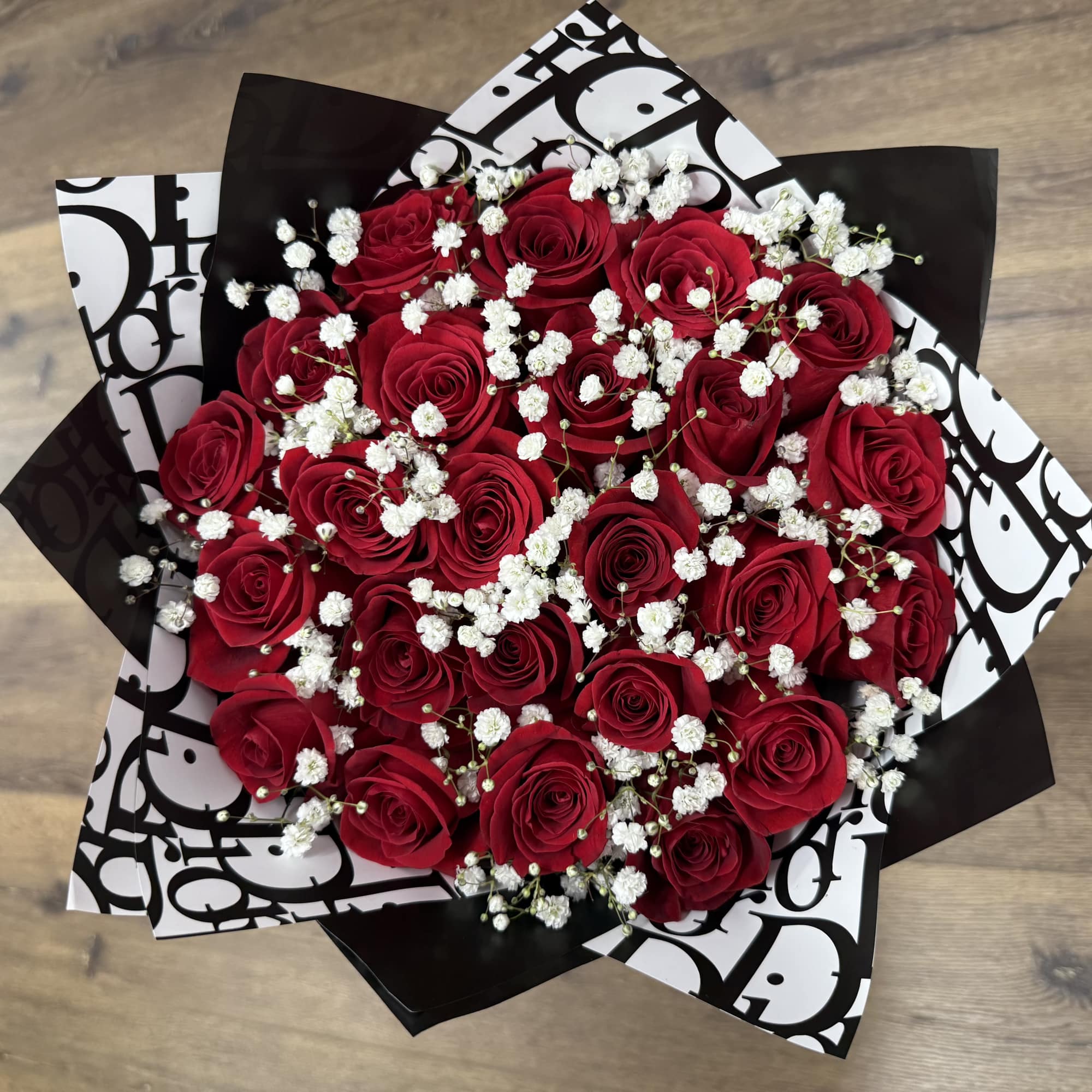 A bold statement of timeless elegance, the Midnight Chic bouquet features rich