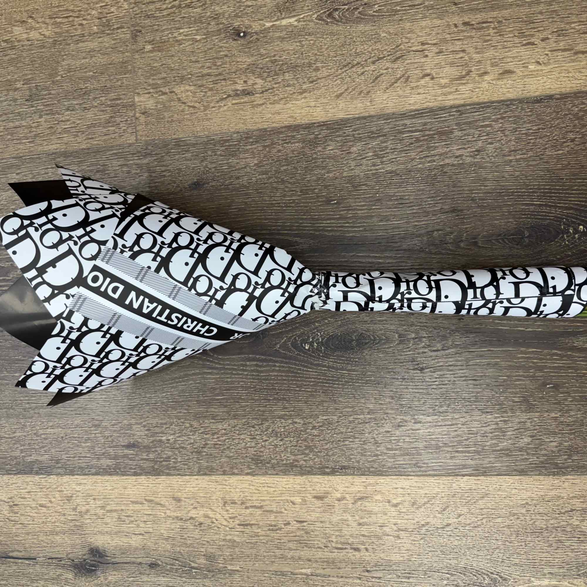 A bold statement of timeless elegance, the Midnight Chic bouquet features rich