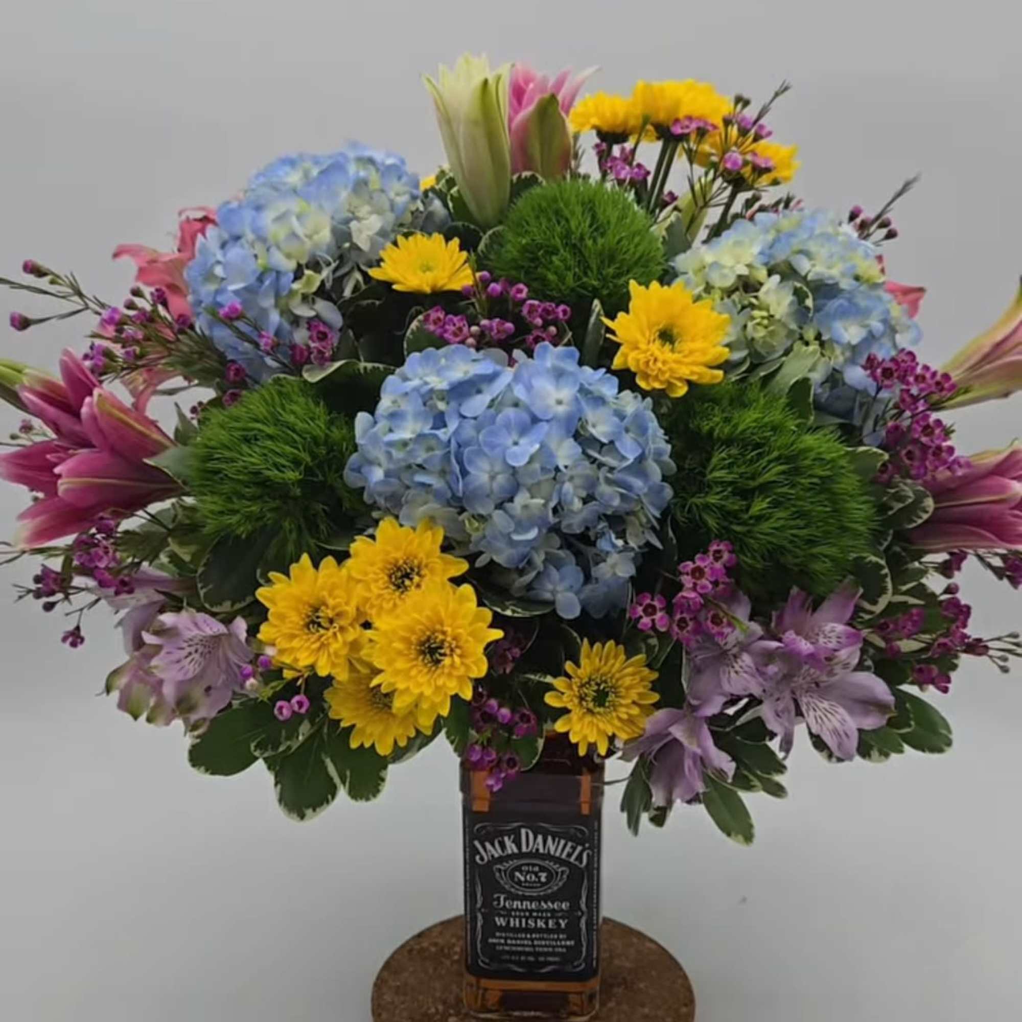 Send a full bottle of wine, flowers and chocolates