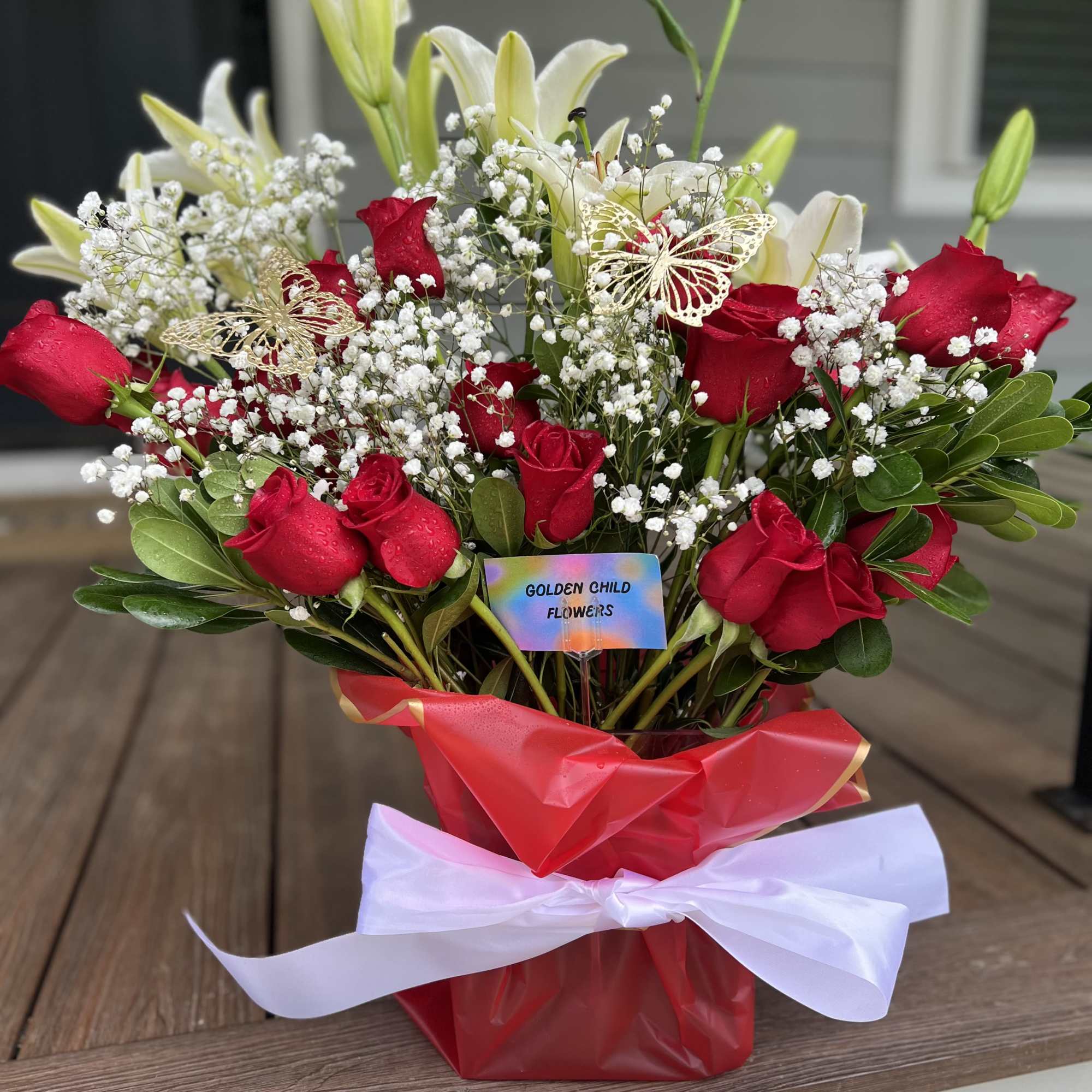 A breathtaking display of love and elegance, Crimson Devotion features two dozen