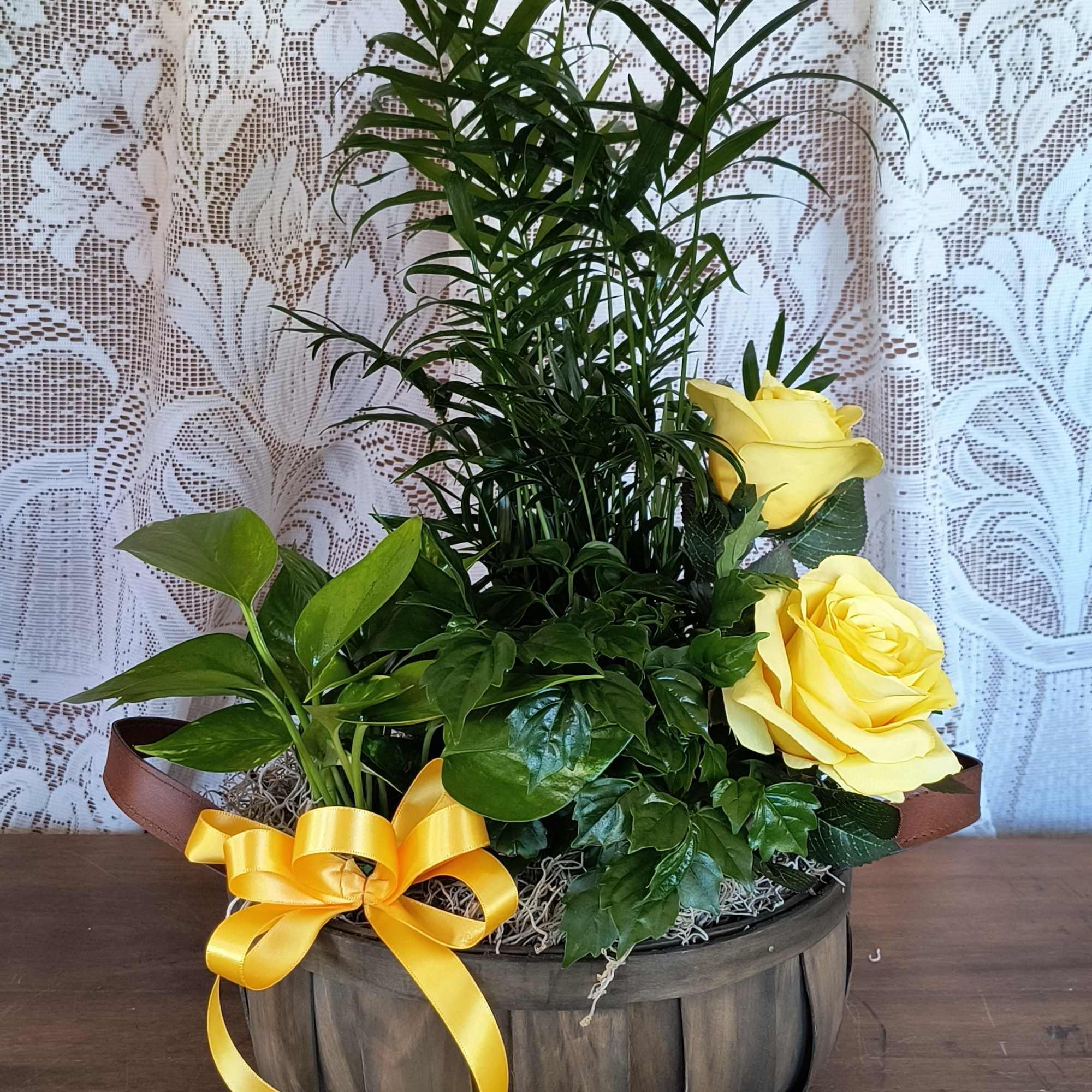 This basket of plants accented with a permanent botanical will send your This basket of plants accented with a permanent botanical will send your