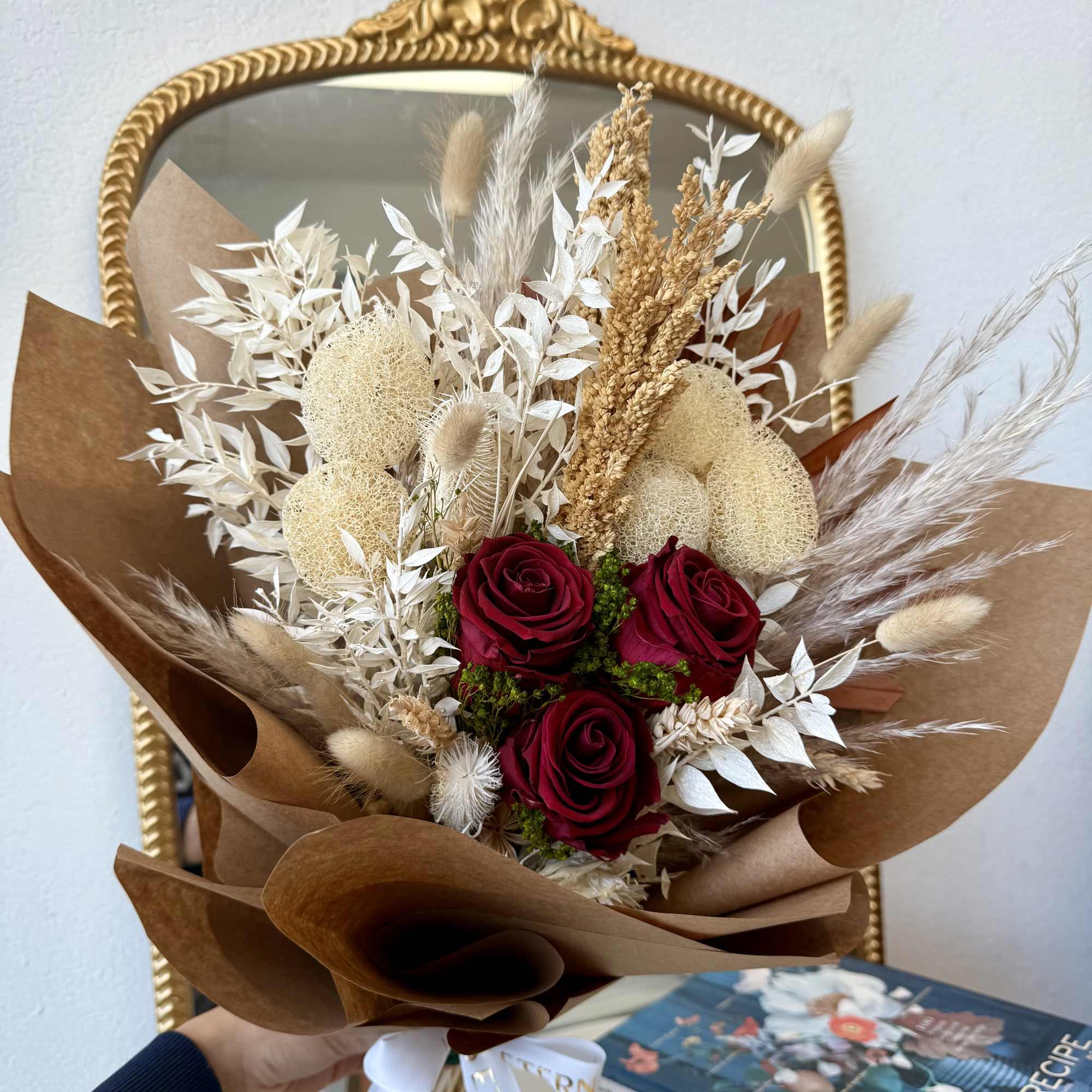 A romantic blend of premium dried florals in soft tones, accented with A romantic blend of premium dried florals in soft tones, accented with