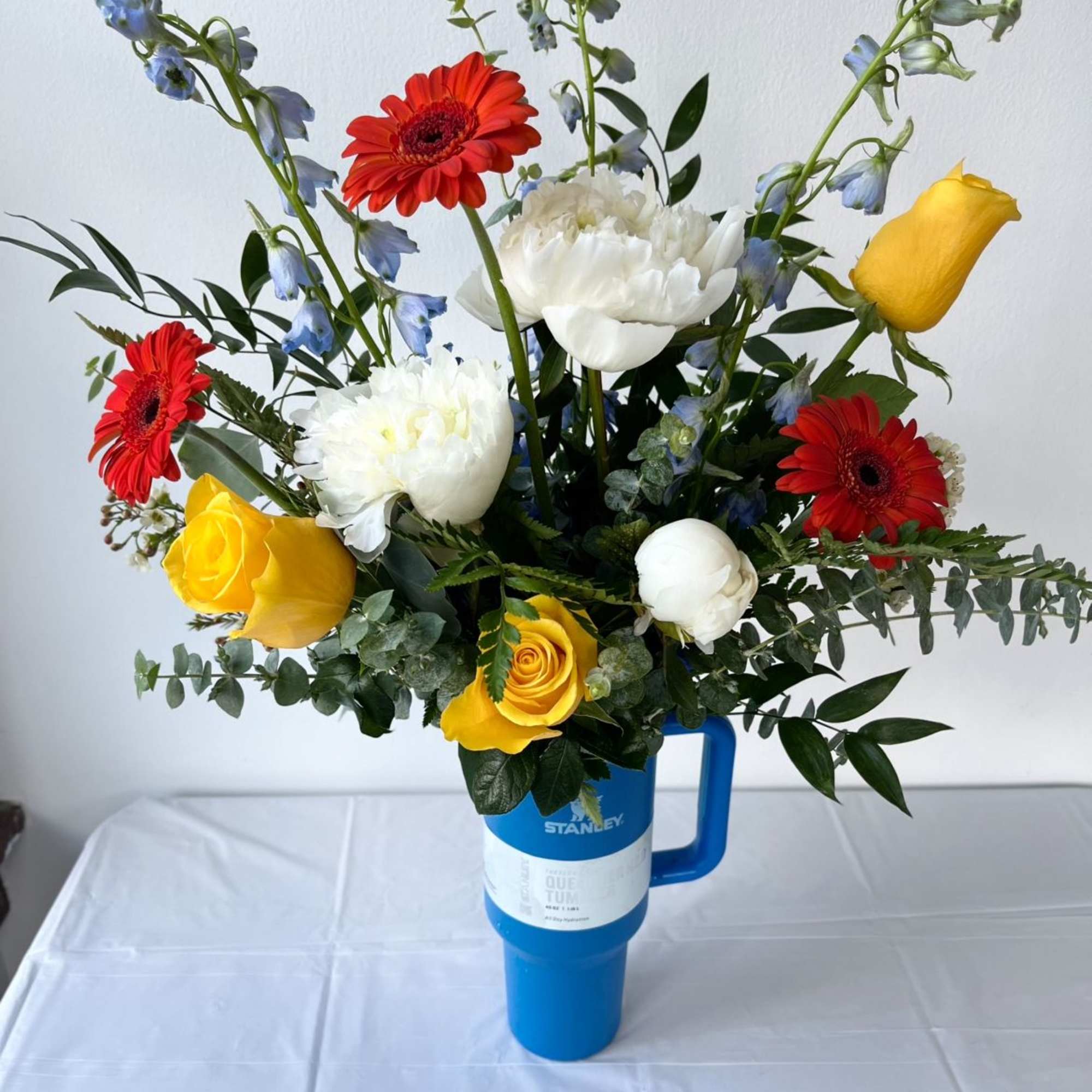 WOW!  40oz Stanley brand tumbler filled with the freshest seasonal blooms WOW!  40oz Stanley brand tumbler filled with the freshest seasonal blooms