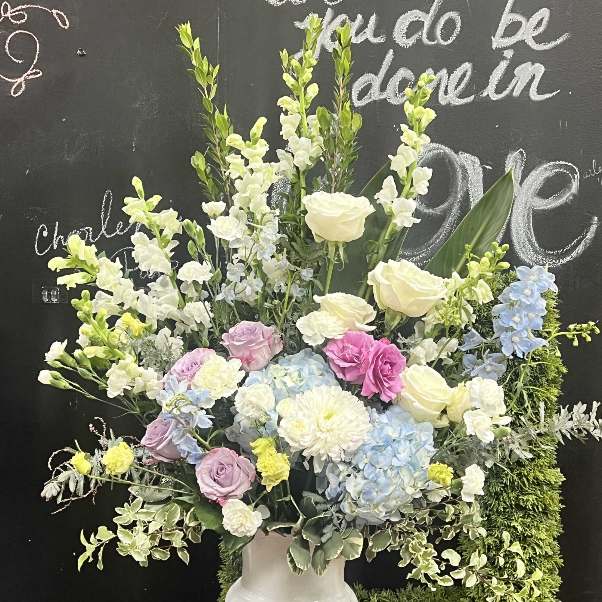 Floor basket arrangement for funeral service. (Color can be your choice)
