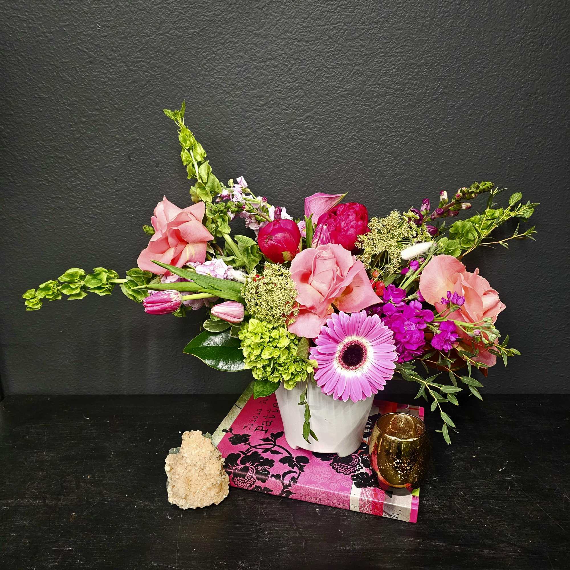 Discover our stunning pink flower arrangement, a vibrant display of elegance and