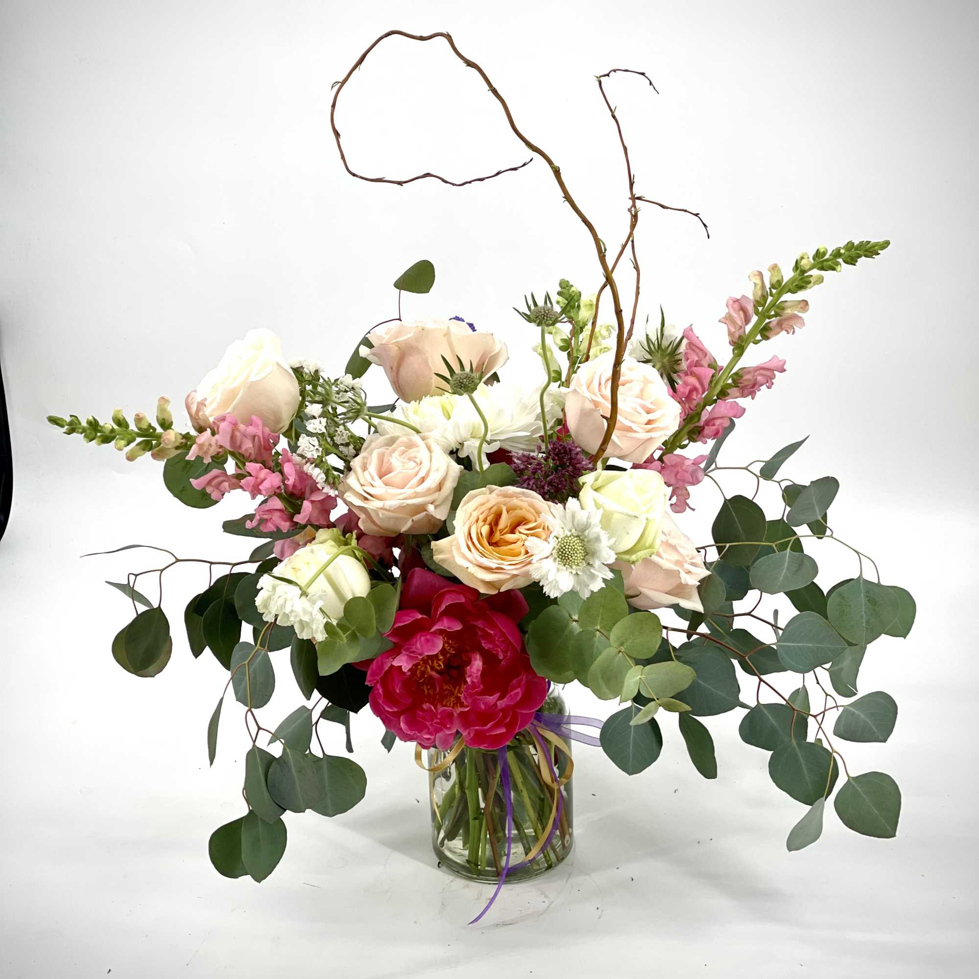 Celebrate special moments with a gift of beautiful feminine blooms ,hand- delivered