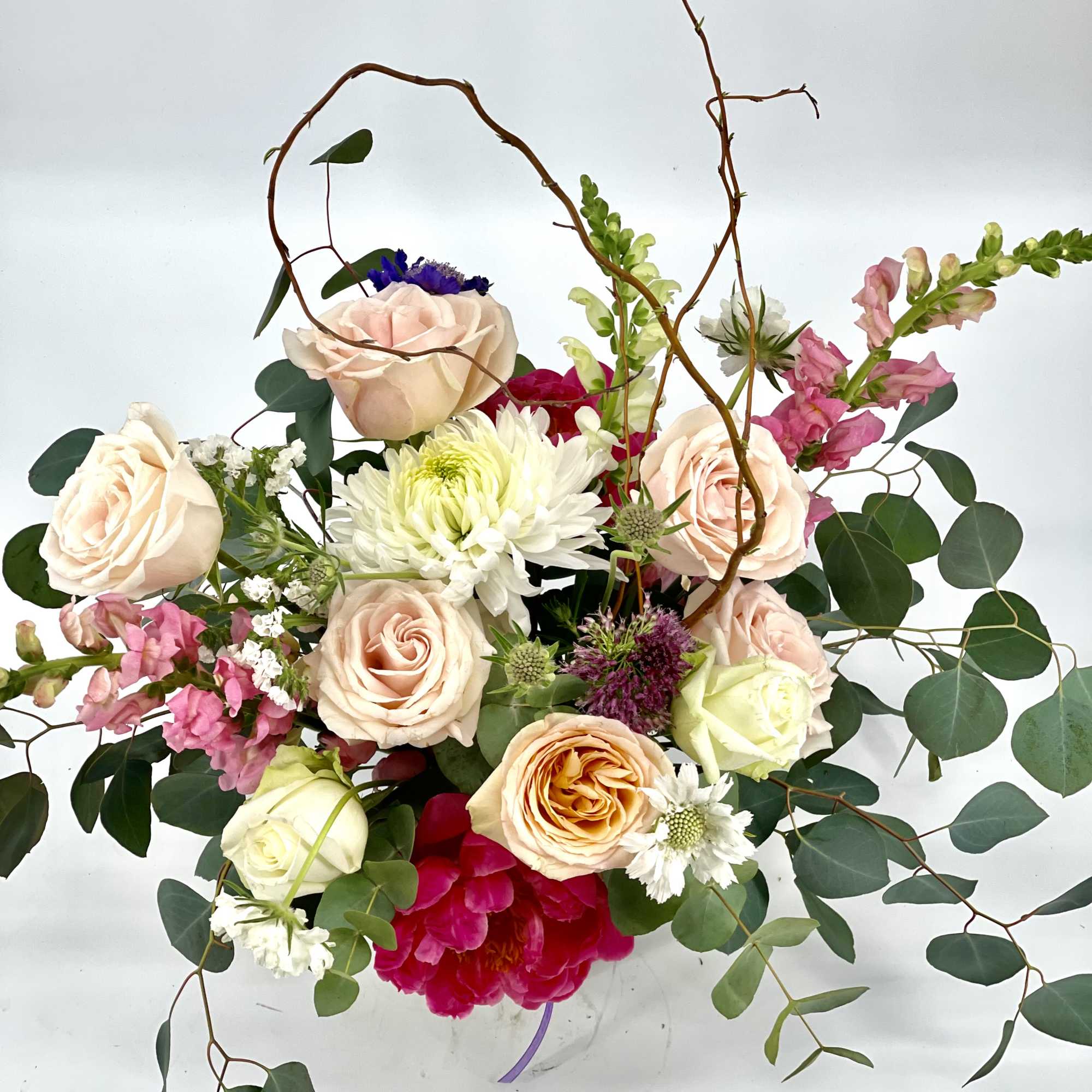 Celebrate special moments with a gift of beautiful feminine blooms ,hand- delivered