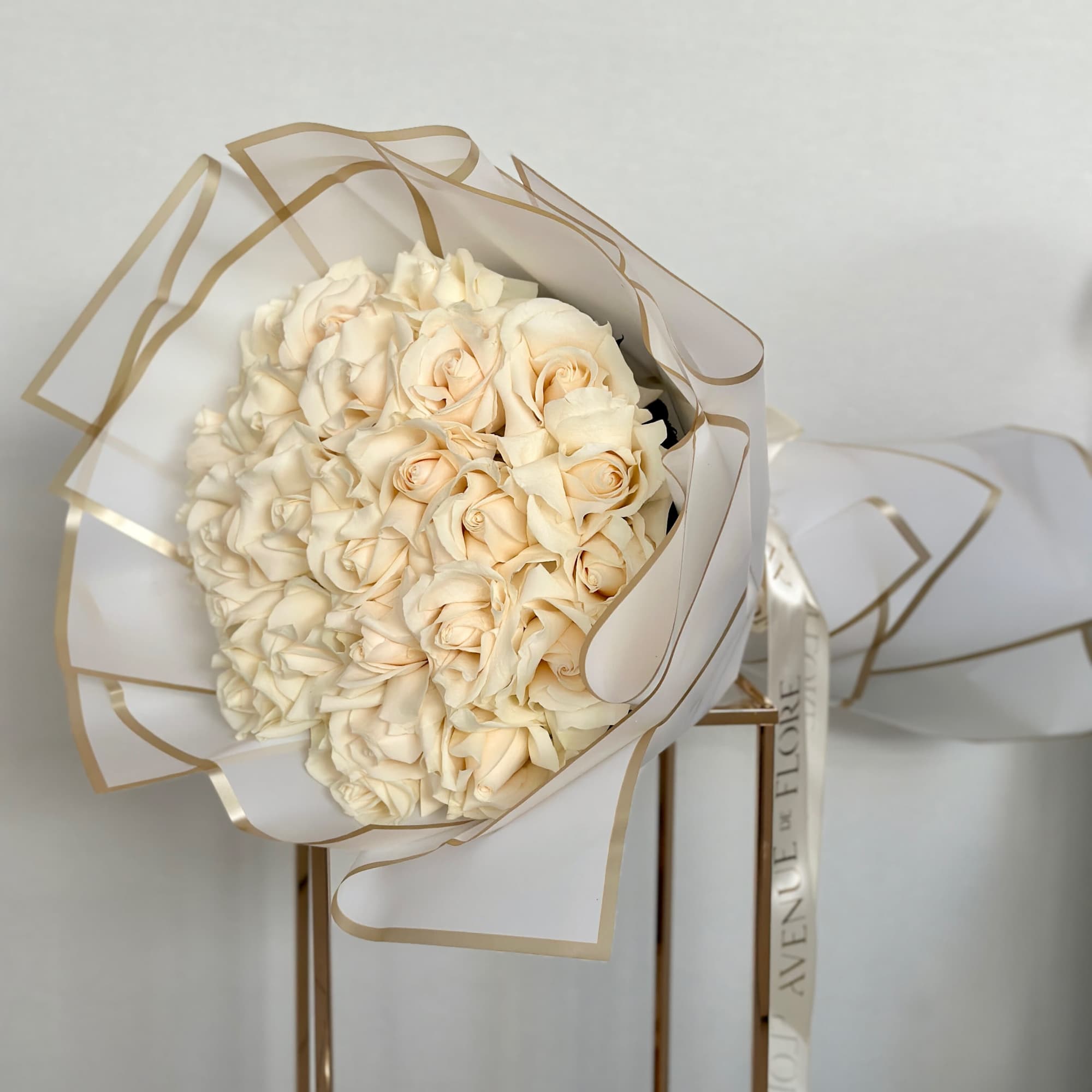 This stunning bouquet of soft white roses is the epitome of timeless