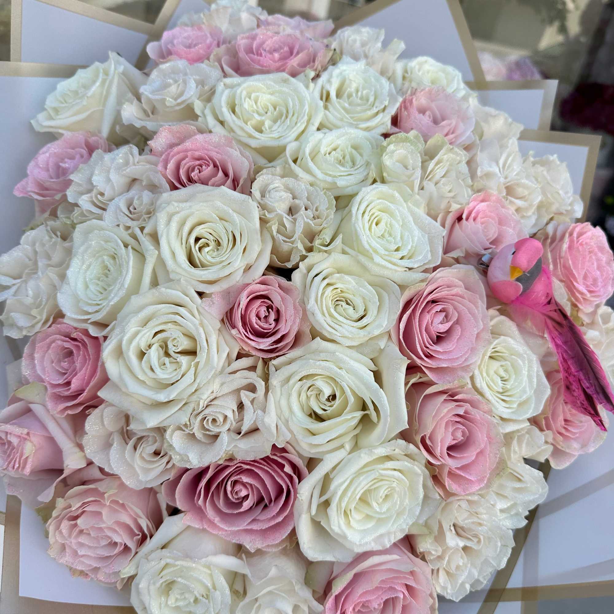 Step into a world of enchantment with our Enchanted Glitter Bouquet, adorned