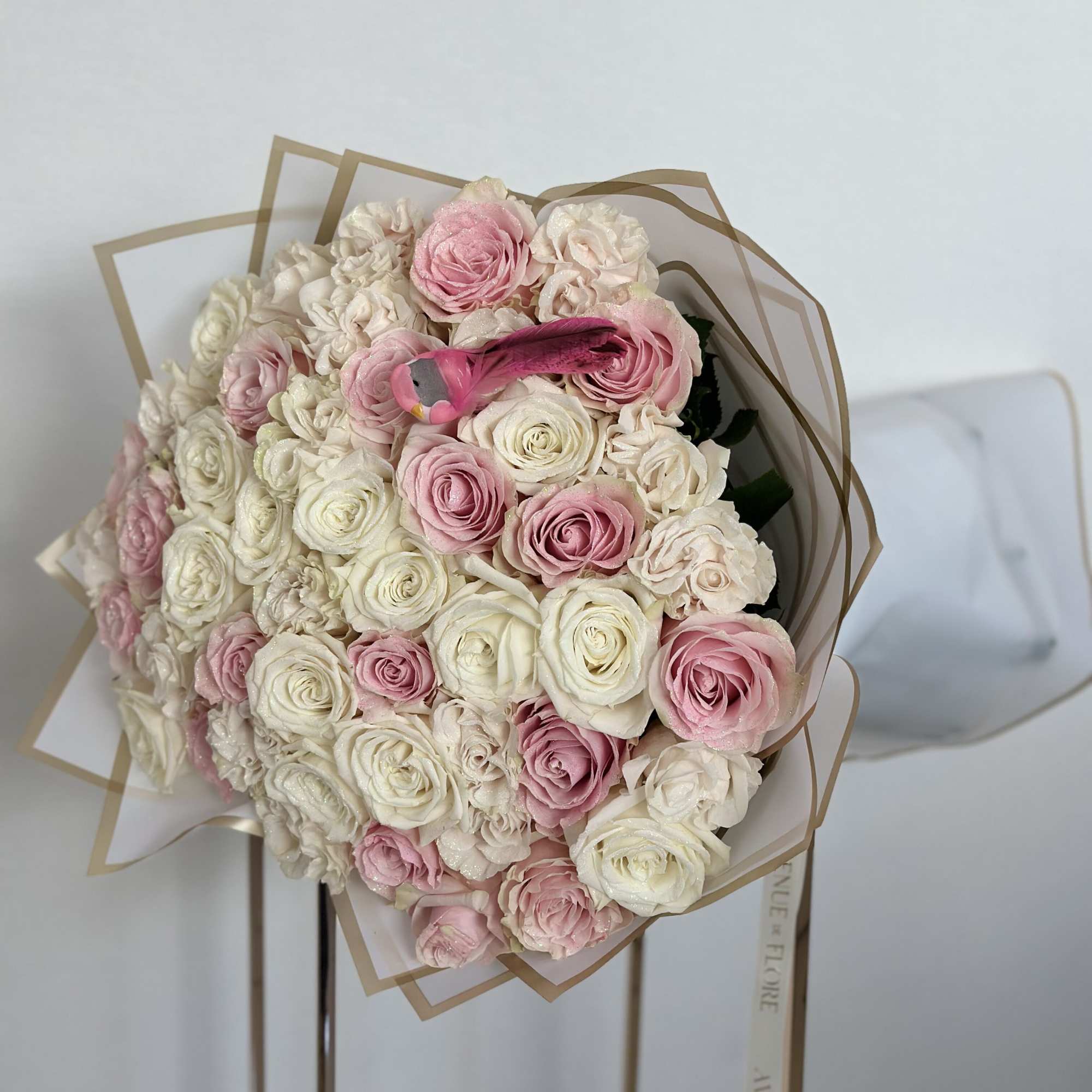 Step into a world of enchantment with our Enchanted Glitter Bouquet, adorned