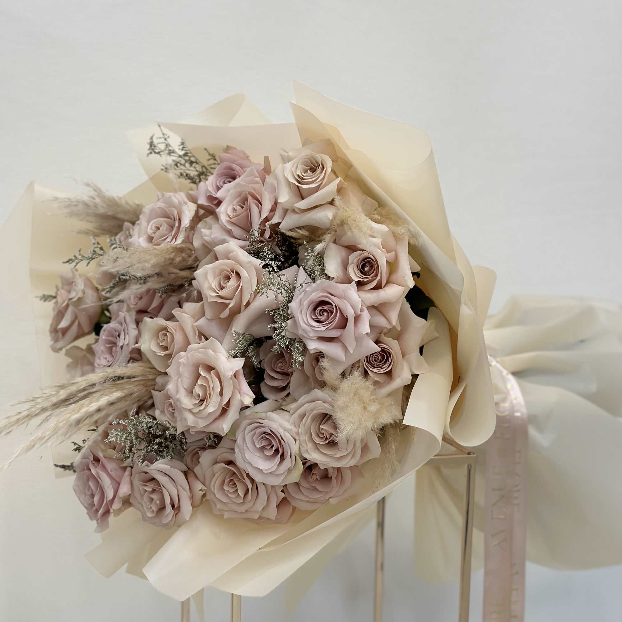 Introducing the &quot;Elegance Bouquet&quot; featuring a mesmerizing array of soft beige roses