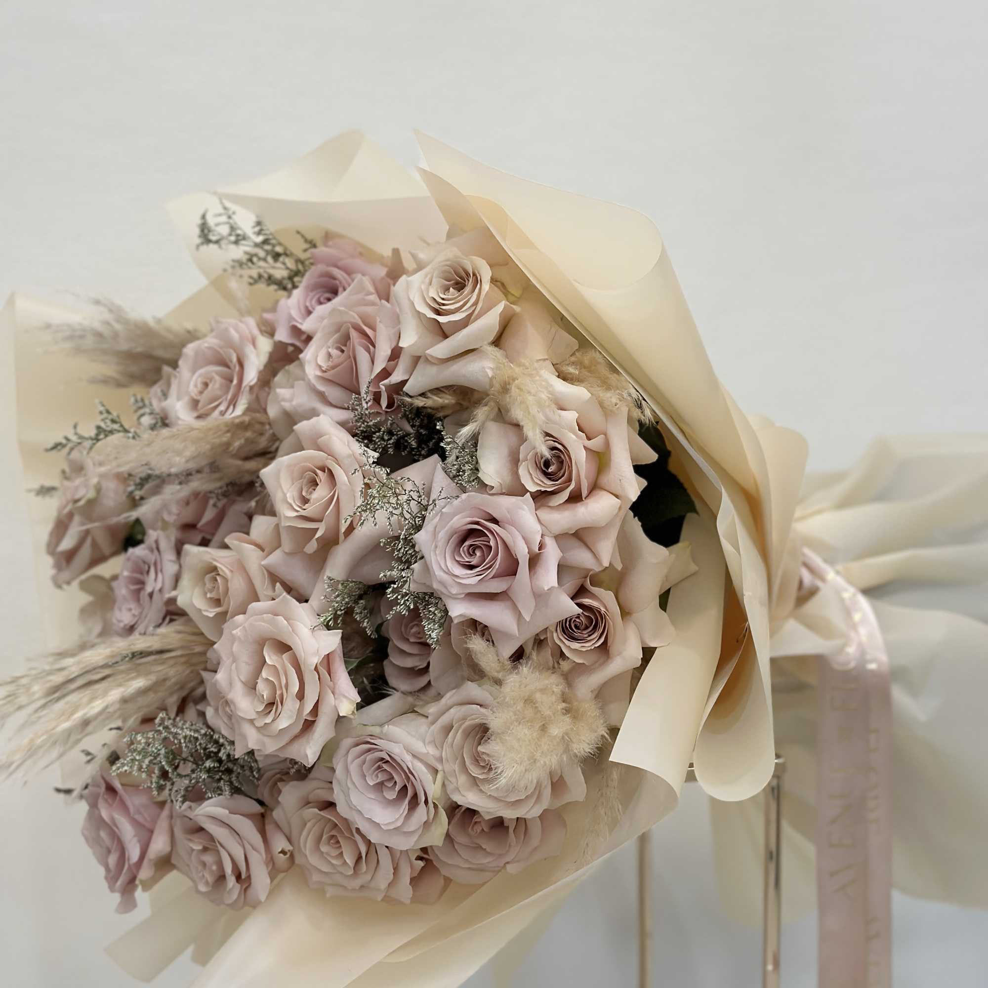 Introducing the &quot;Elegance Bouquet&quot; featuring a mesmerizing array of soft beige roses