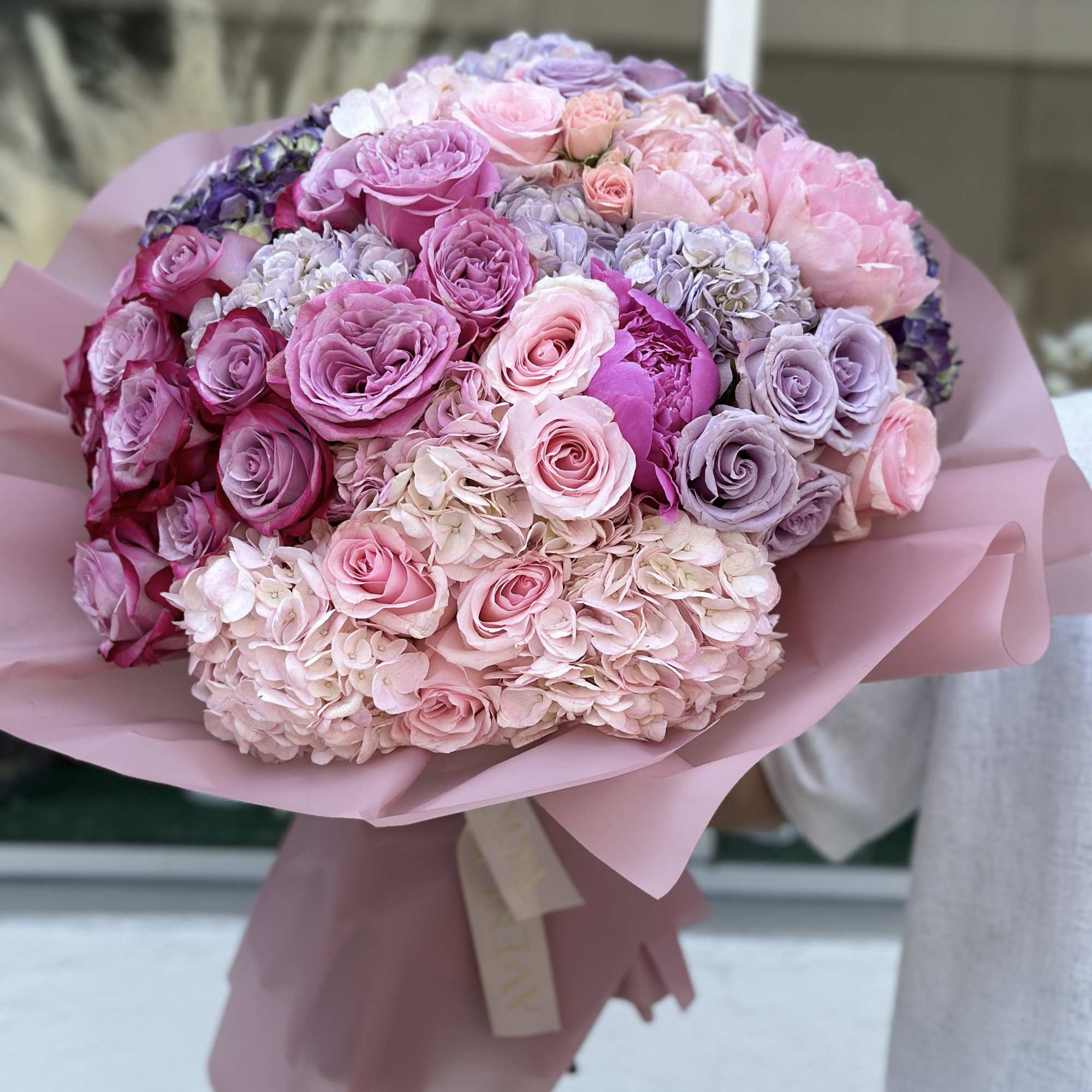 Delicate and enchanting, this pastel bouquet whispers of romance and serenity. Nestled