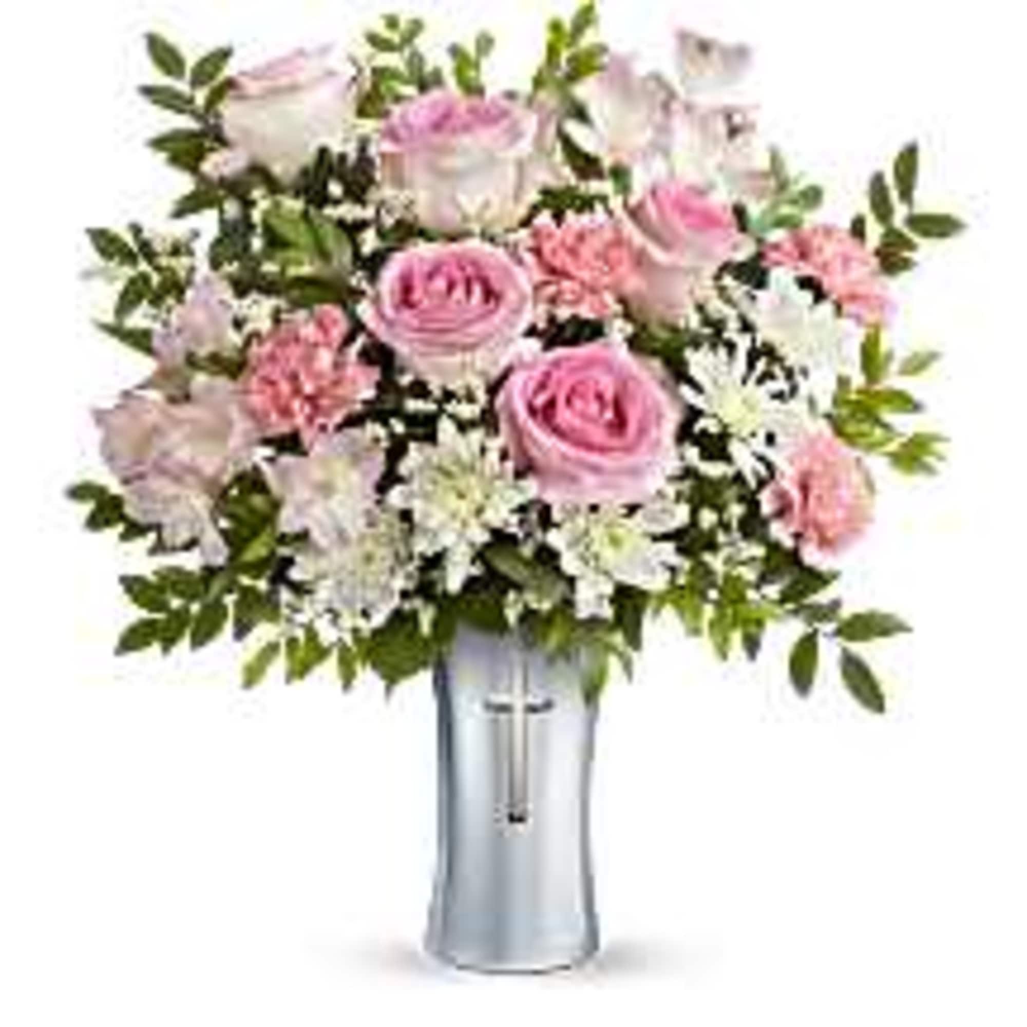 Soft and serene, this graceful bouquet of delicate pink and white blooms