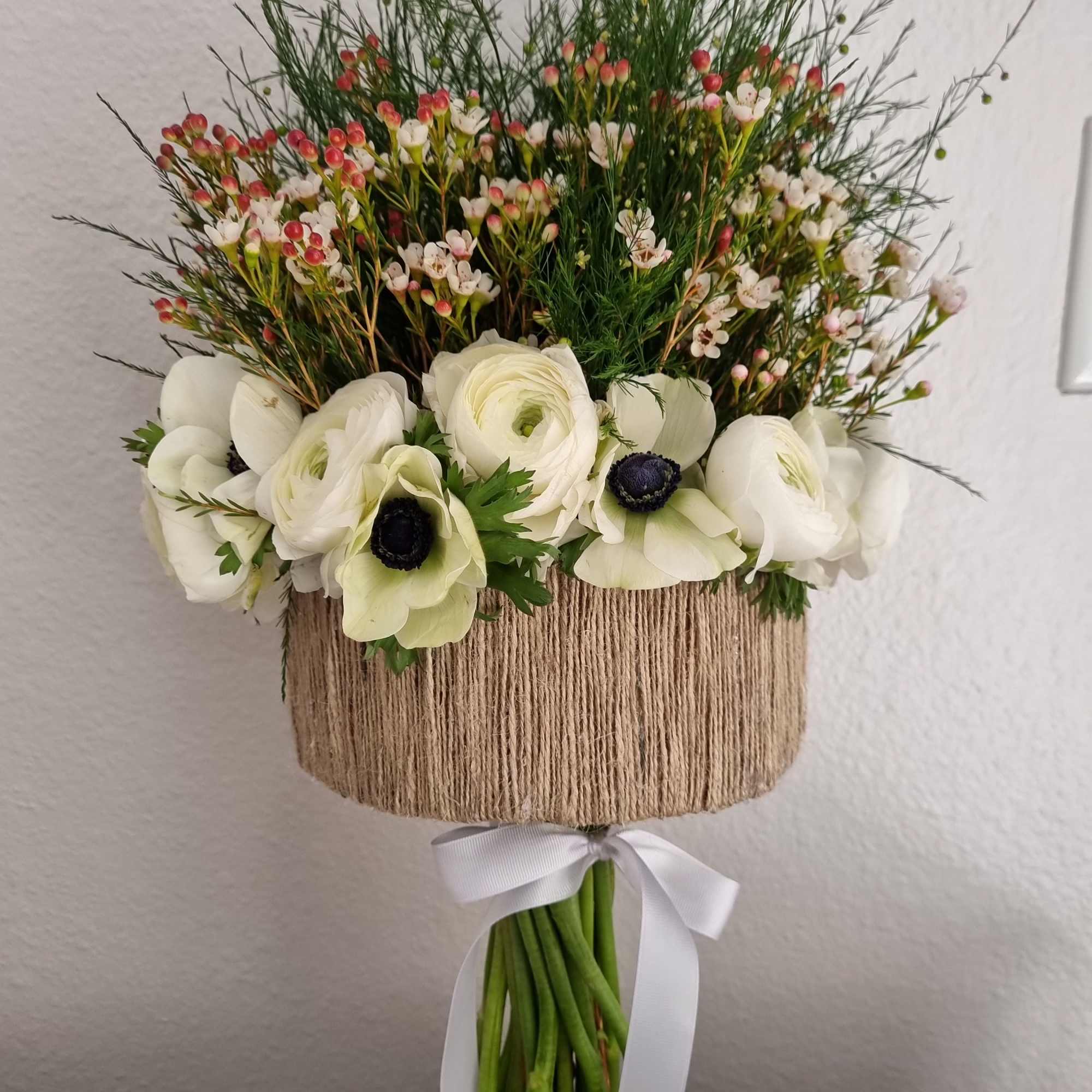 a stunning arrangement featuring a harmonies blend of vibrant blooms and soft