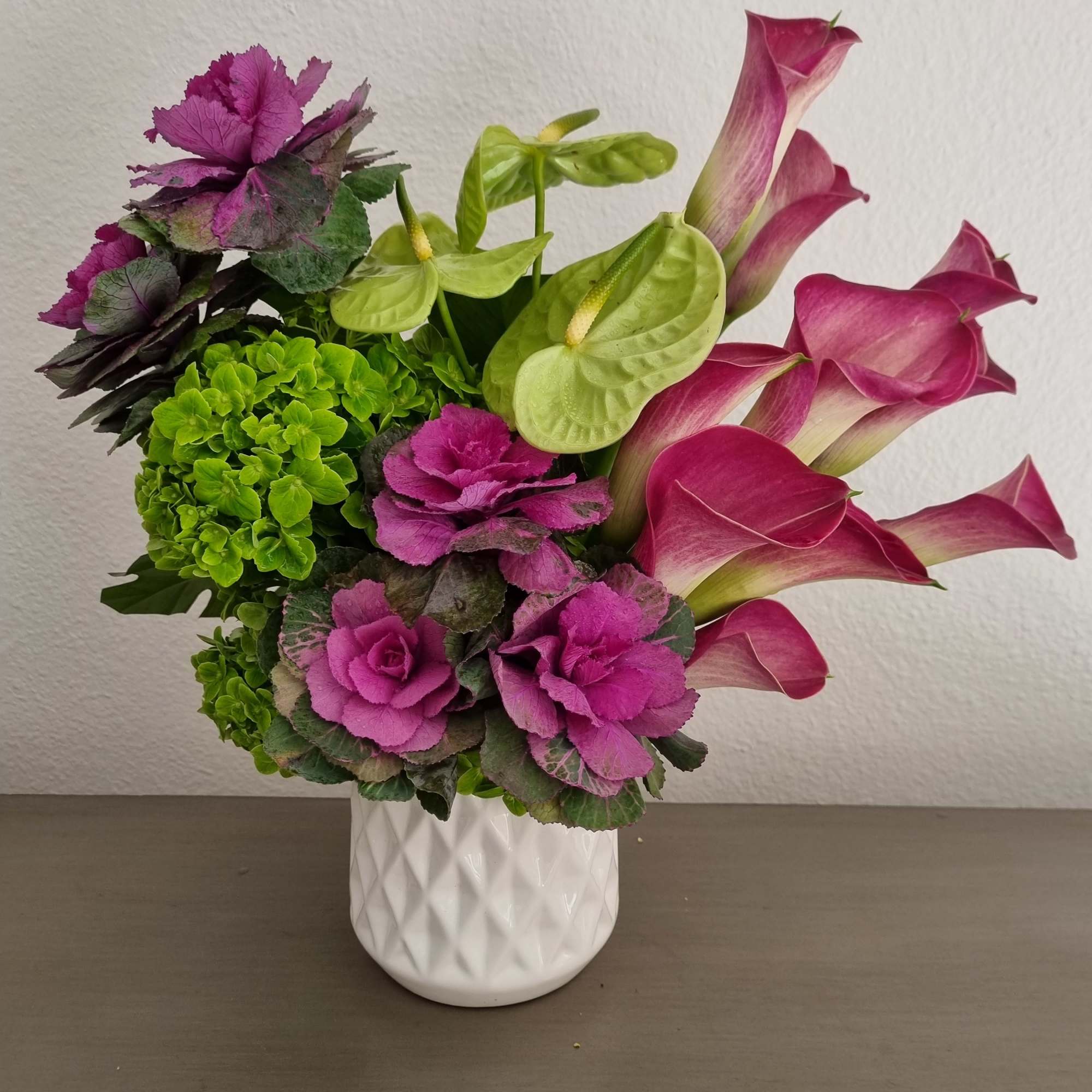 Bright your day with an elegant bouquet. Featuring a stunning arrangement. This