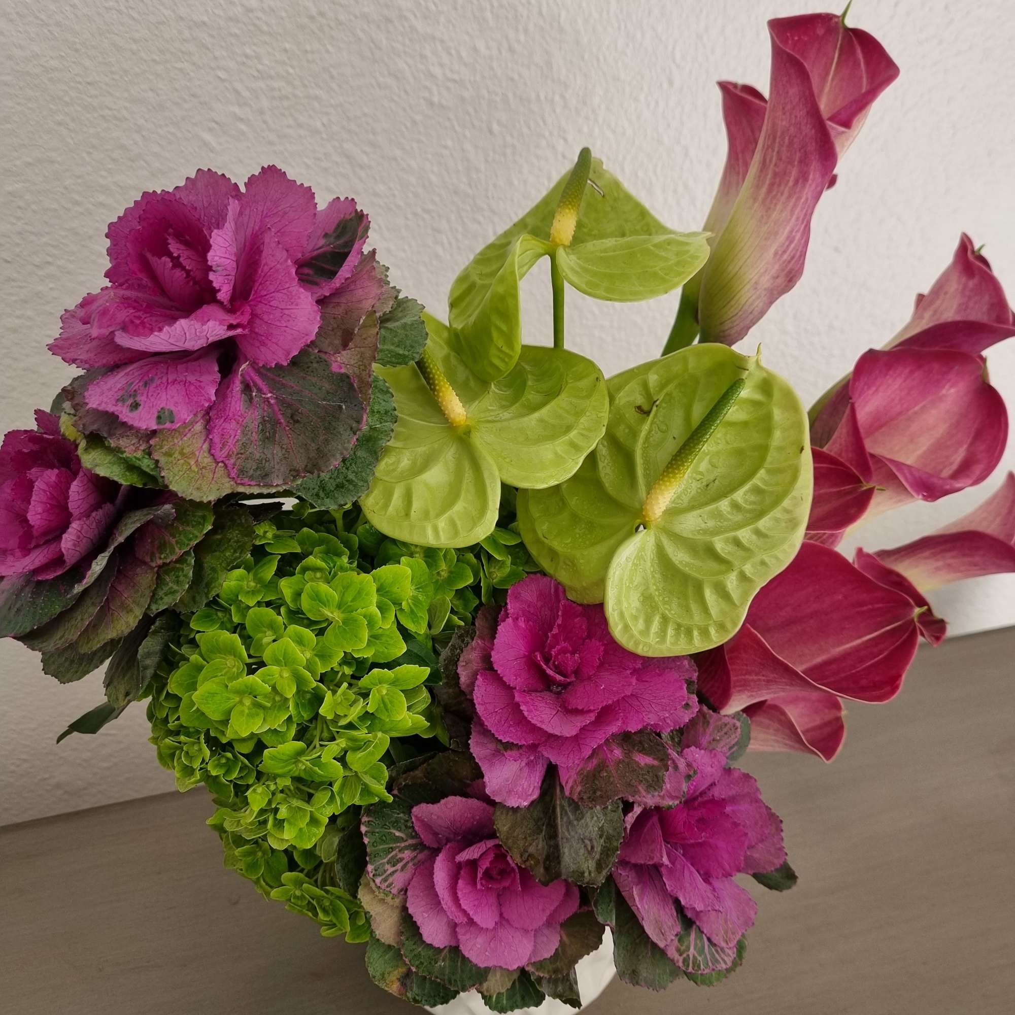 Bright your day with an elegant bouquet. Featuring a stunning arrangement. This