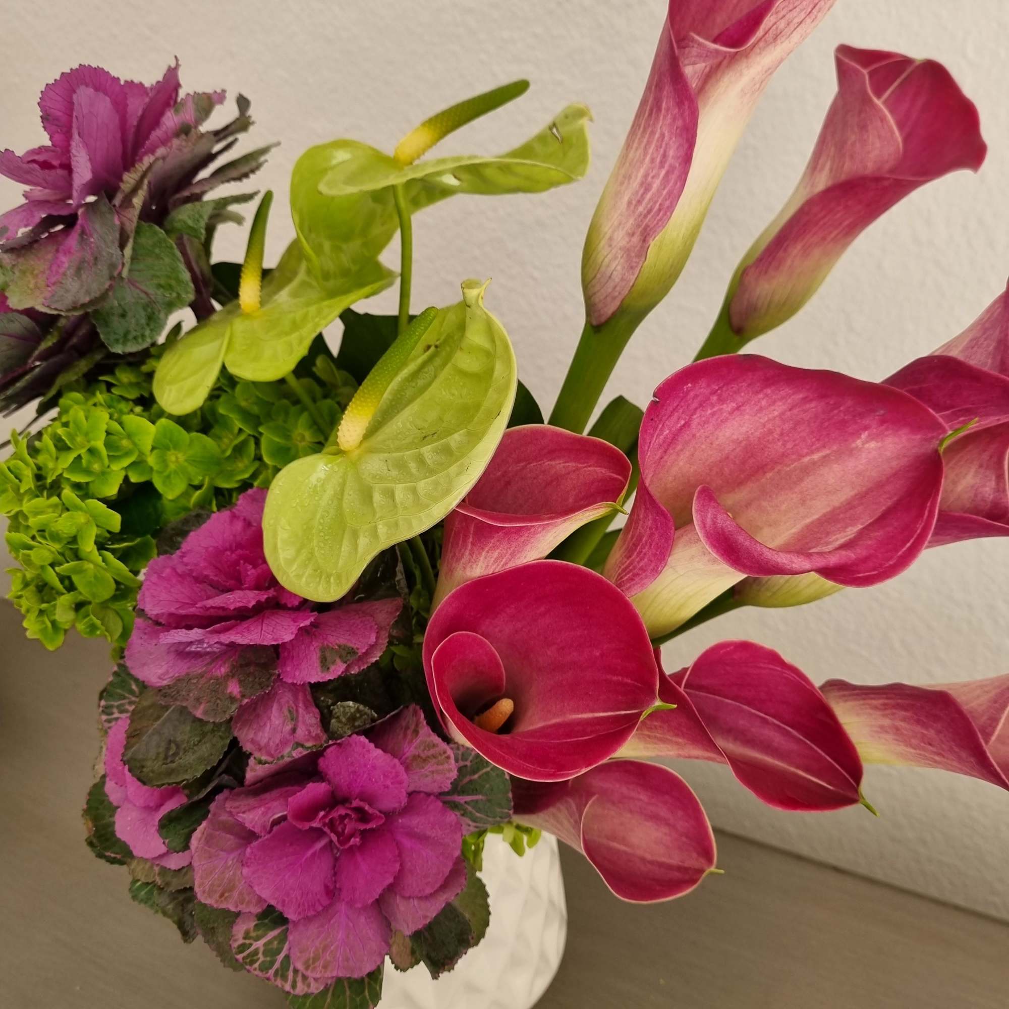 Bright your day with an elegant bouquet. Featuring a stunning arrangement. This