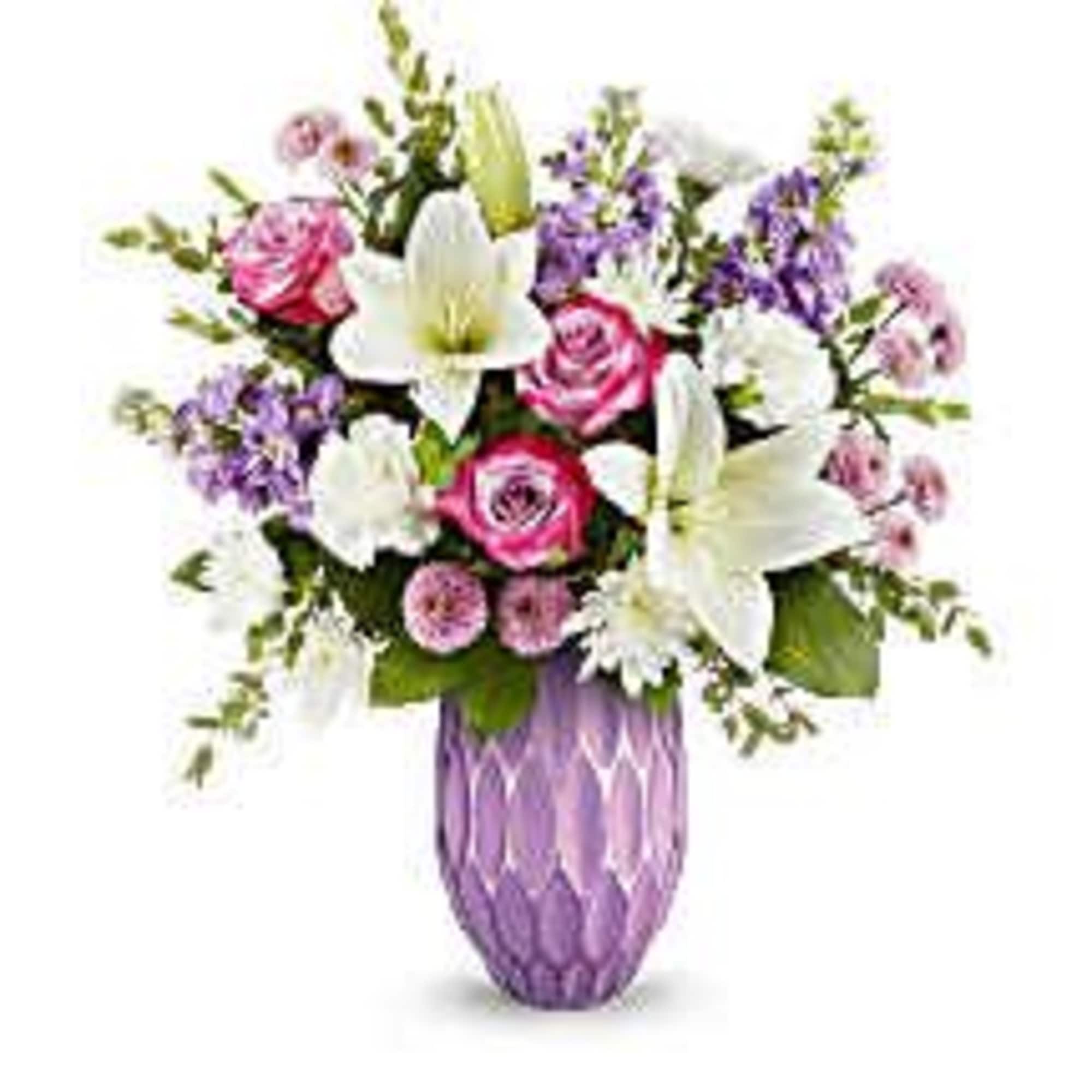 featuring a gorgeous lavender mercury-inspired sculpted glass vase filled with elegant white