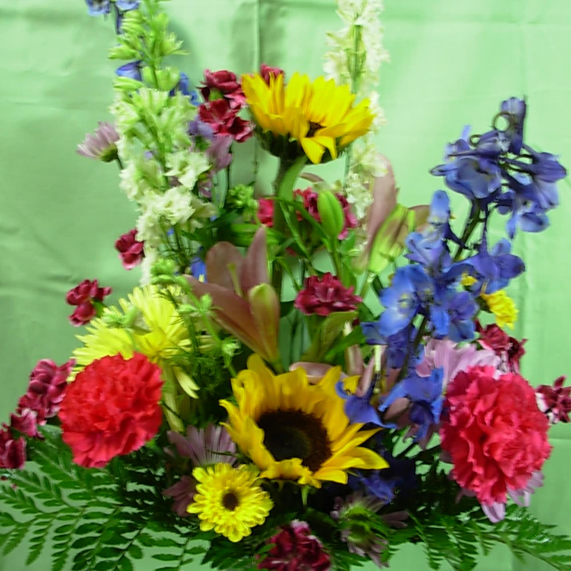 Our bright, colorful, vibrant BRILLIANT GARDEN BOUQUET if a dazzling vase arrangement
