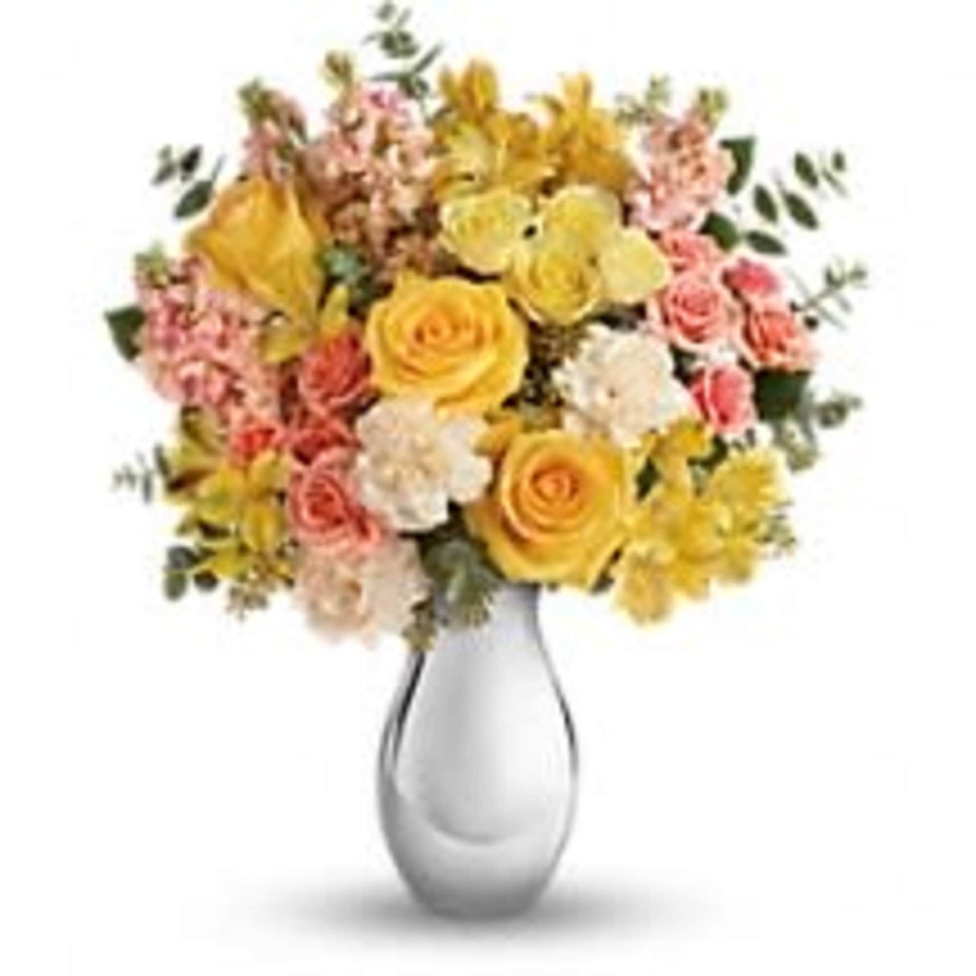  sunshiny blooms and a sparkling silver vase combine to striking effect