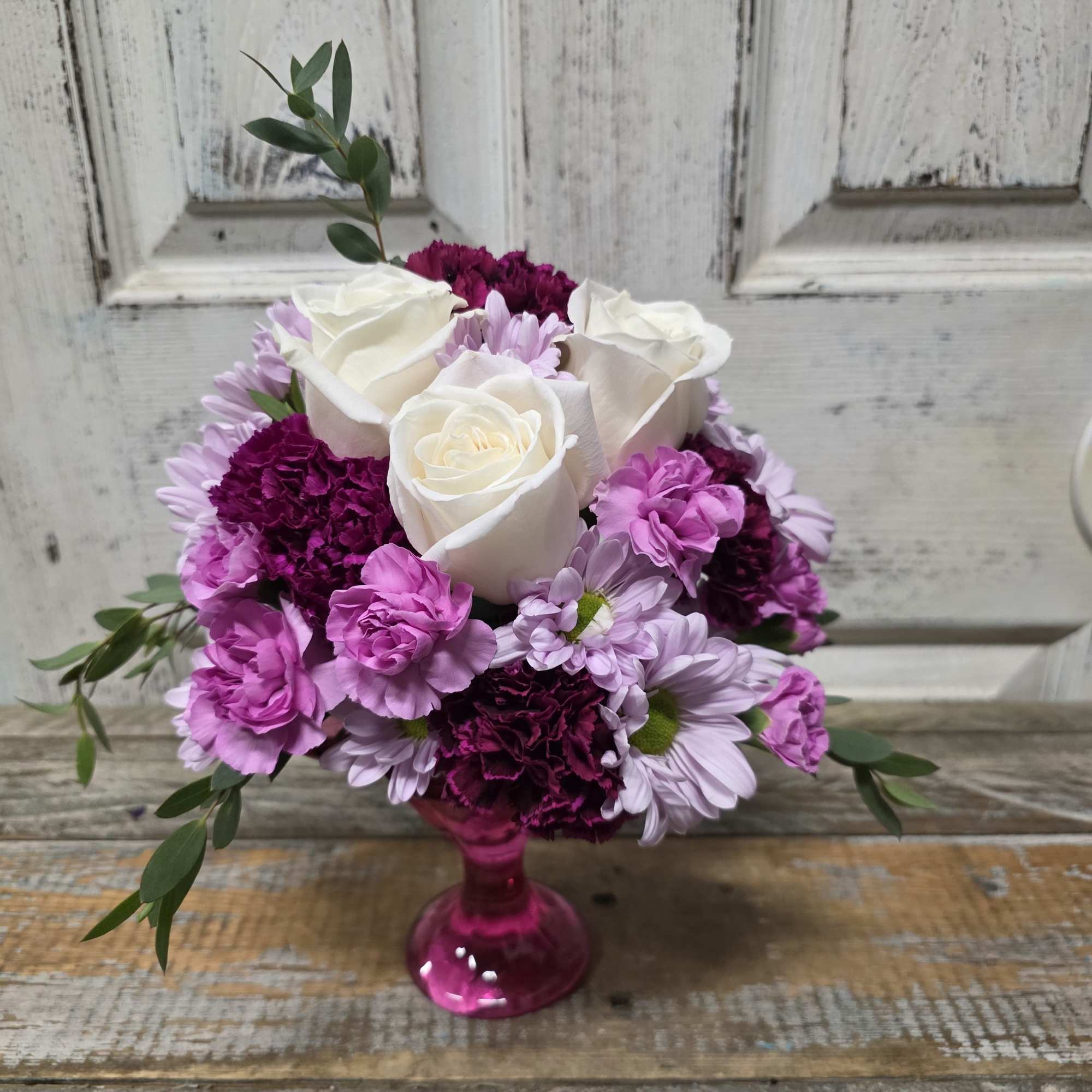 A one of a kind creation designed in a reusable glass cup