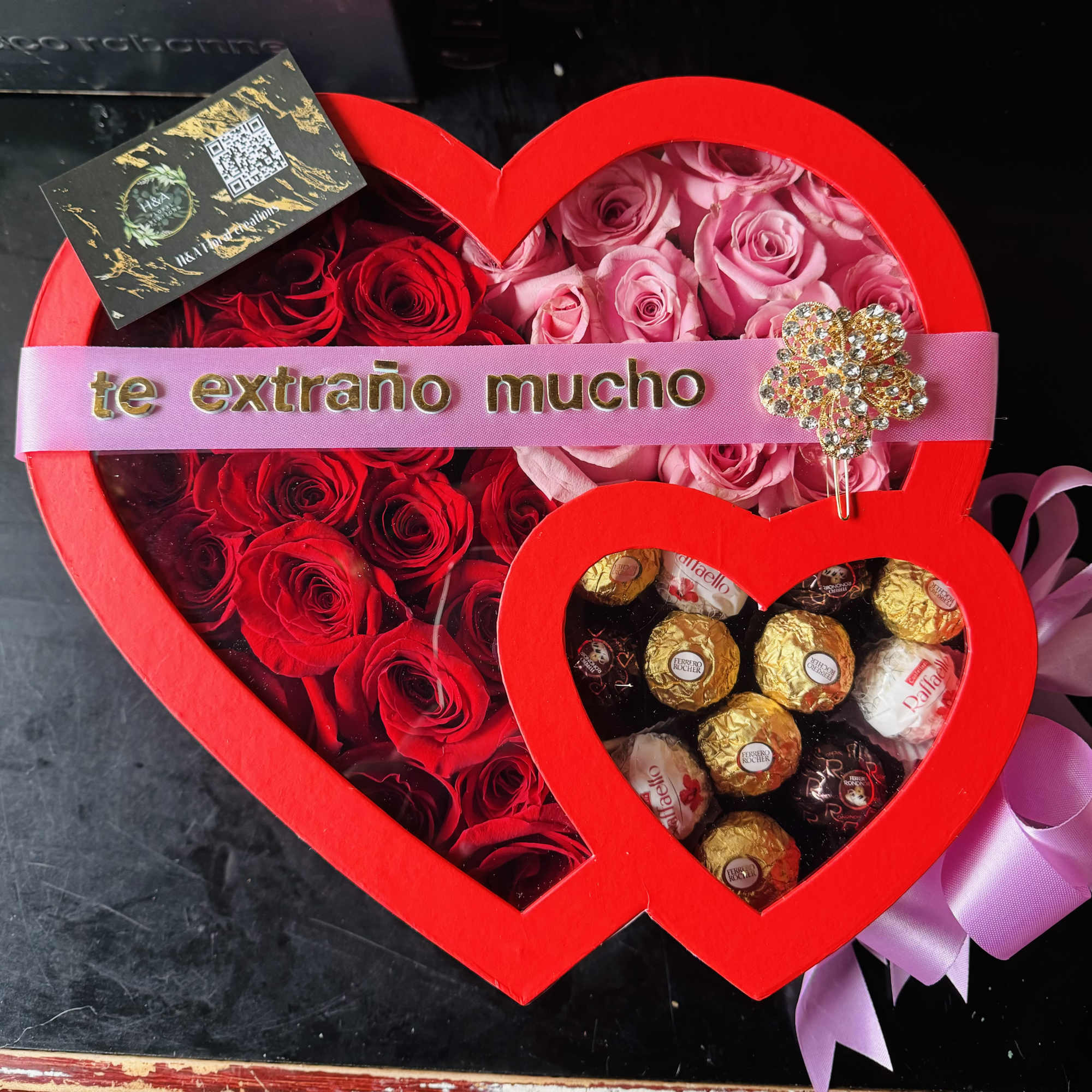 Romantic heart box made up of red and pink roses, with a